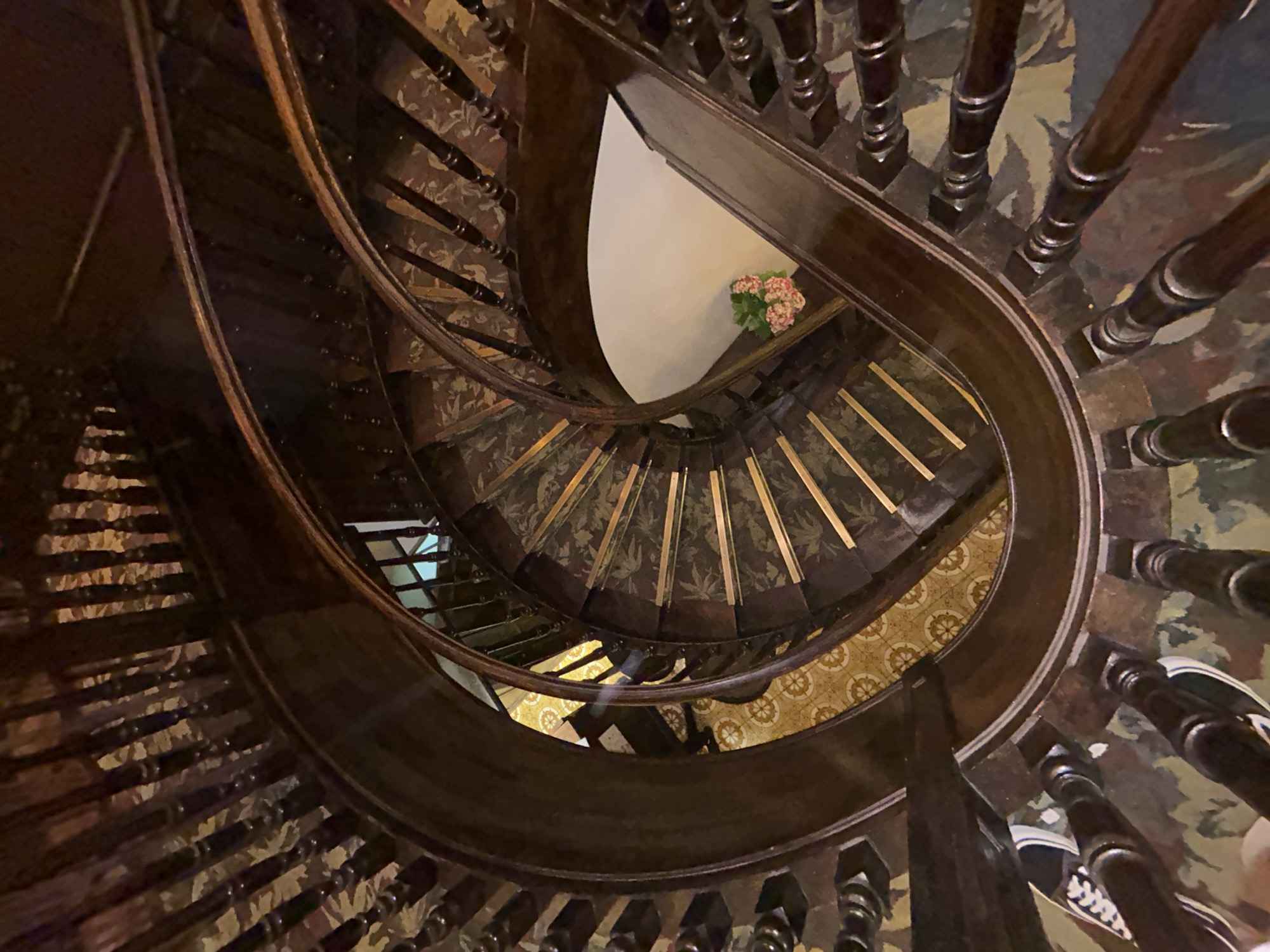 Ornate staircases and wine bars on a Paris evening