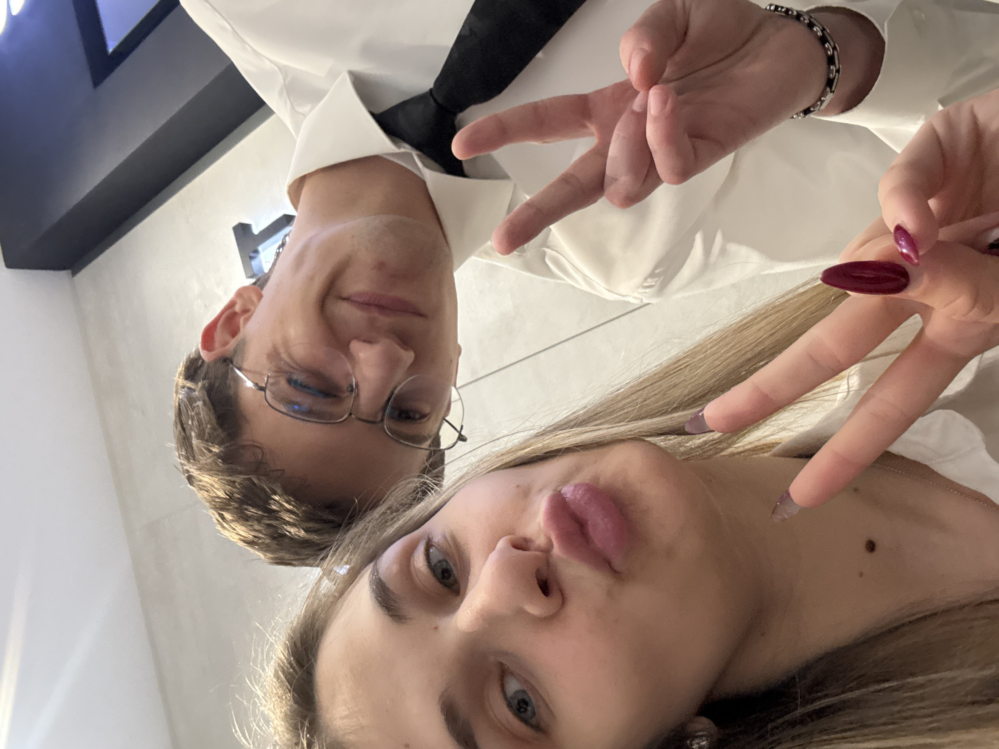 Two people pose for indoor selfie in Sofia