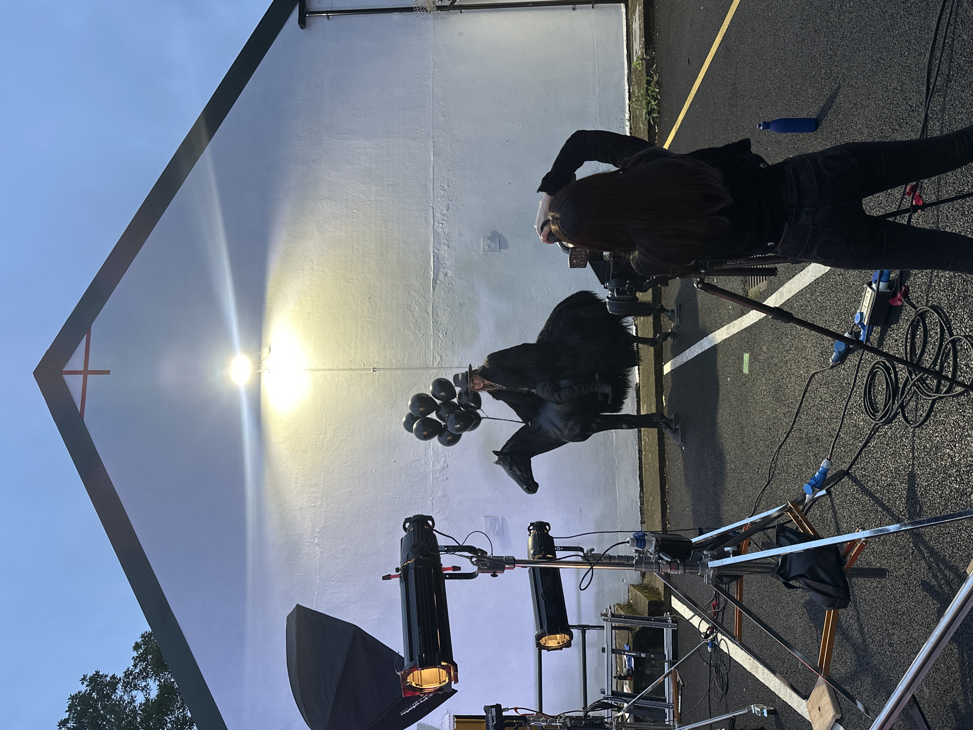 Outdoor photoshoot with horse prop filmed in London parking lot