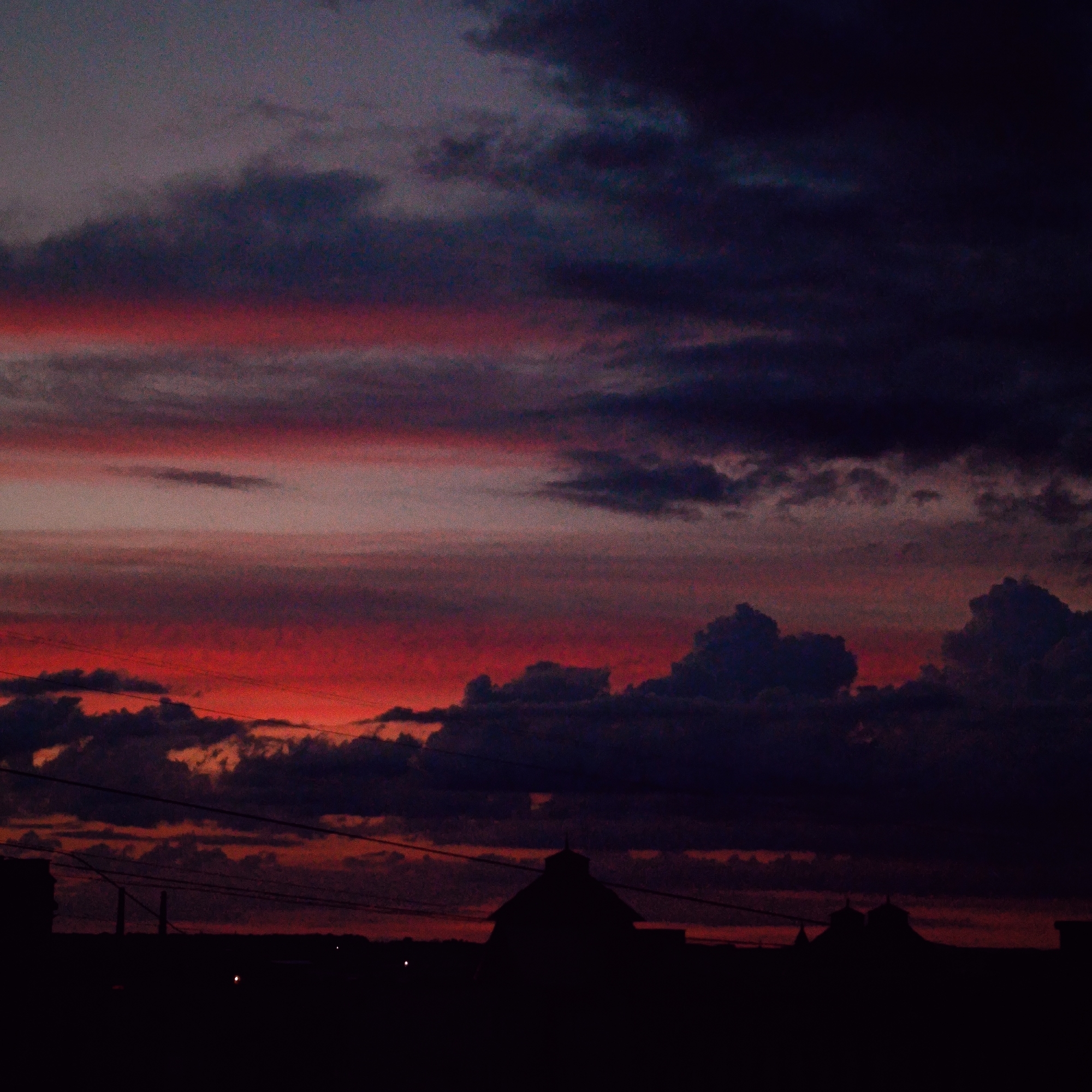 City skyline at sunset, tracked from afternoon into dusk