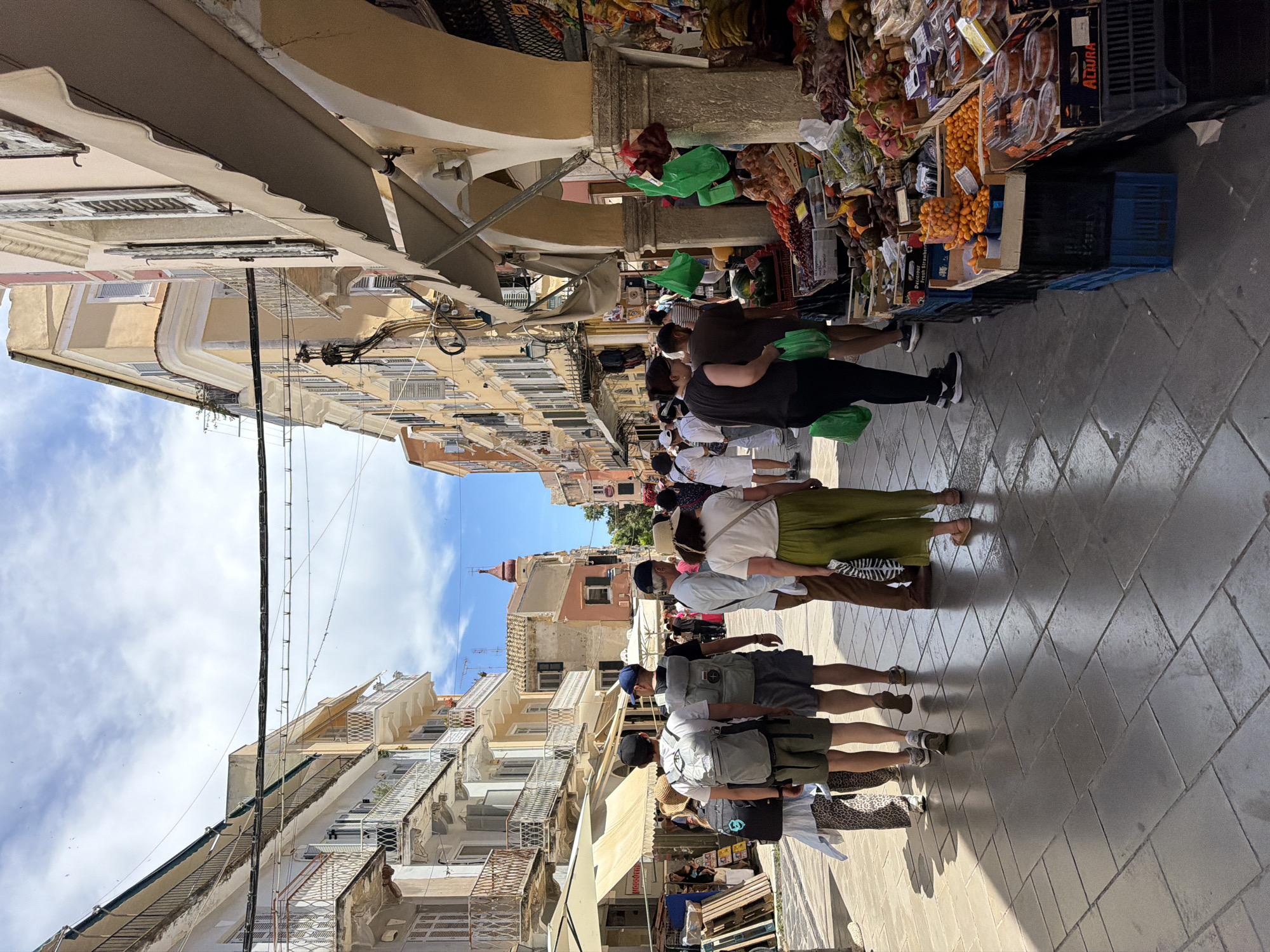 Tourist captures sunny morning scenes across historic Corfu streets