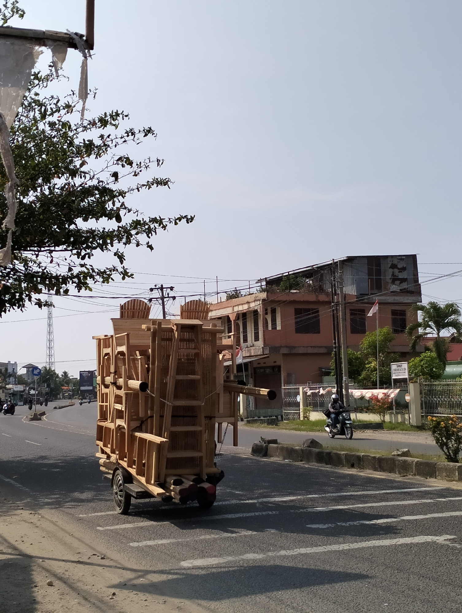 Furniture-laden trailer blocks traffic lane in Lhokseumawe, Indonesia