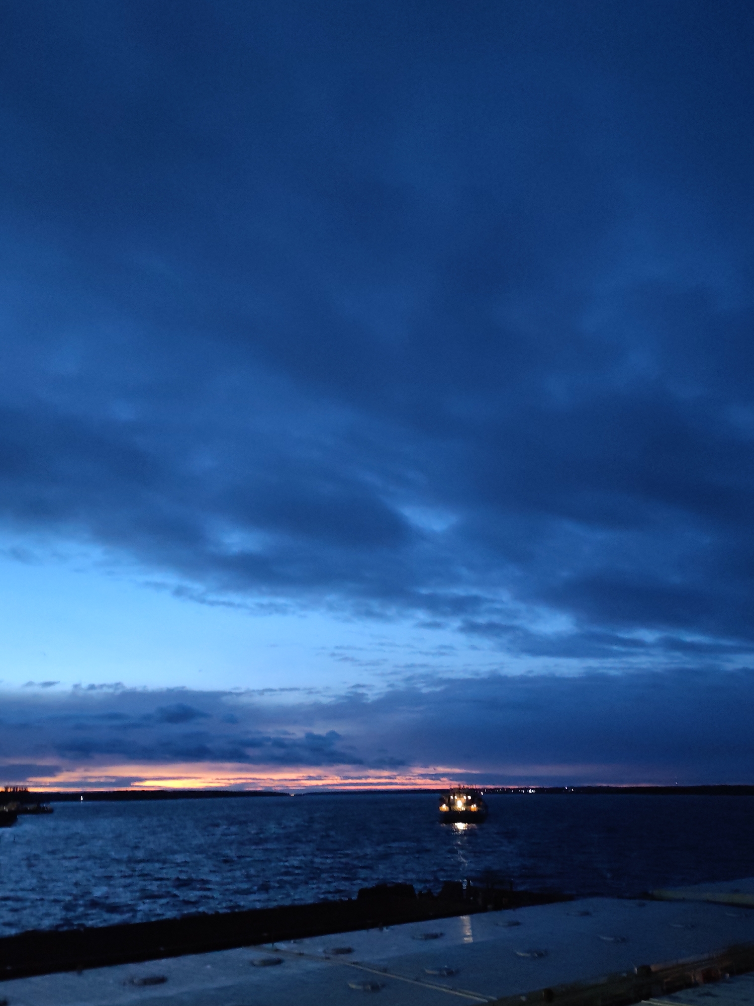 Twilight observed over water in Russian village