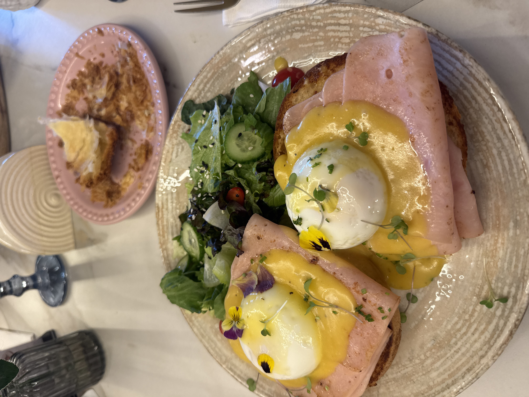 Diner enjoys Eggs Benedict meal at Puebla restaurant