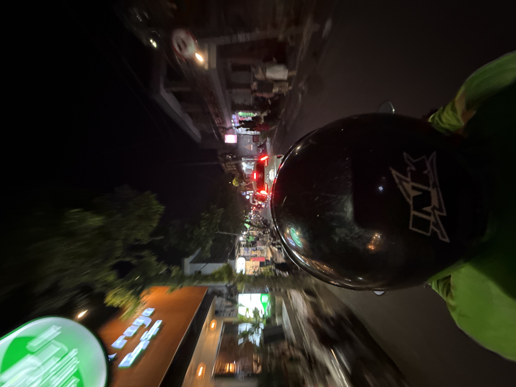 Motorcycle rider captures nighttime journey through Ubud District