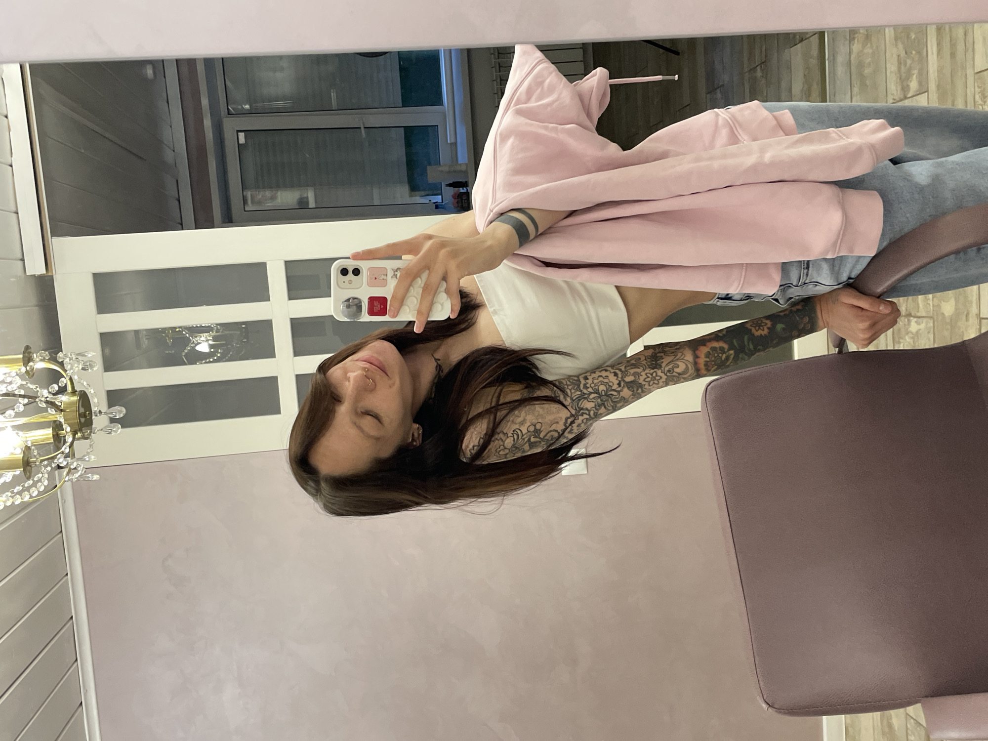 Woman takes mirror selfie in Izhevsk, Russia
