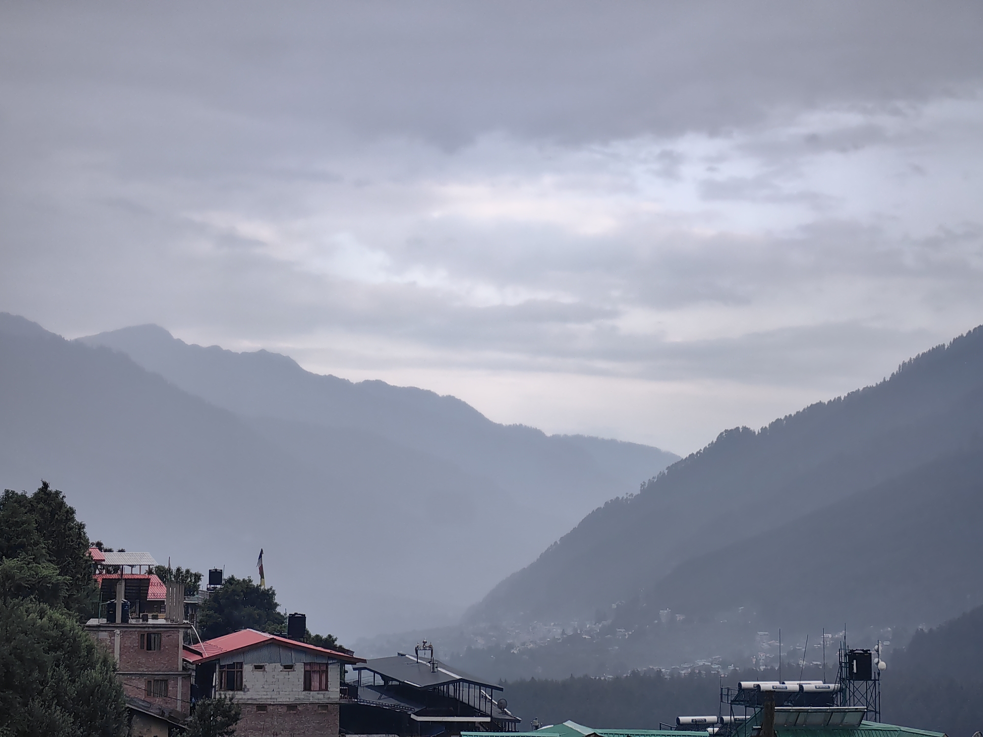 Misty mountain valley views documented in Vashisht, India