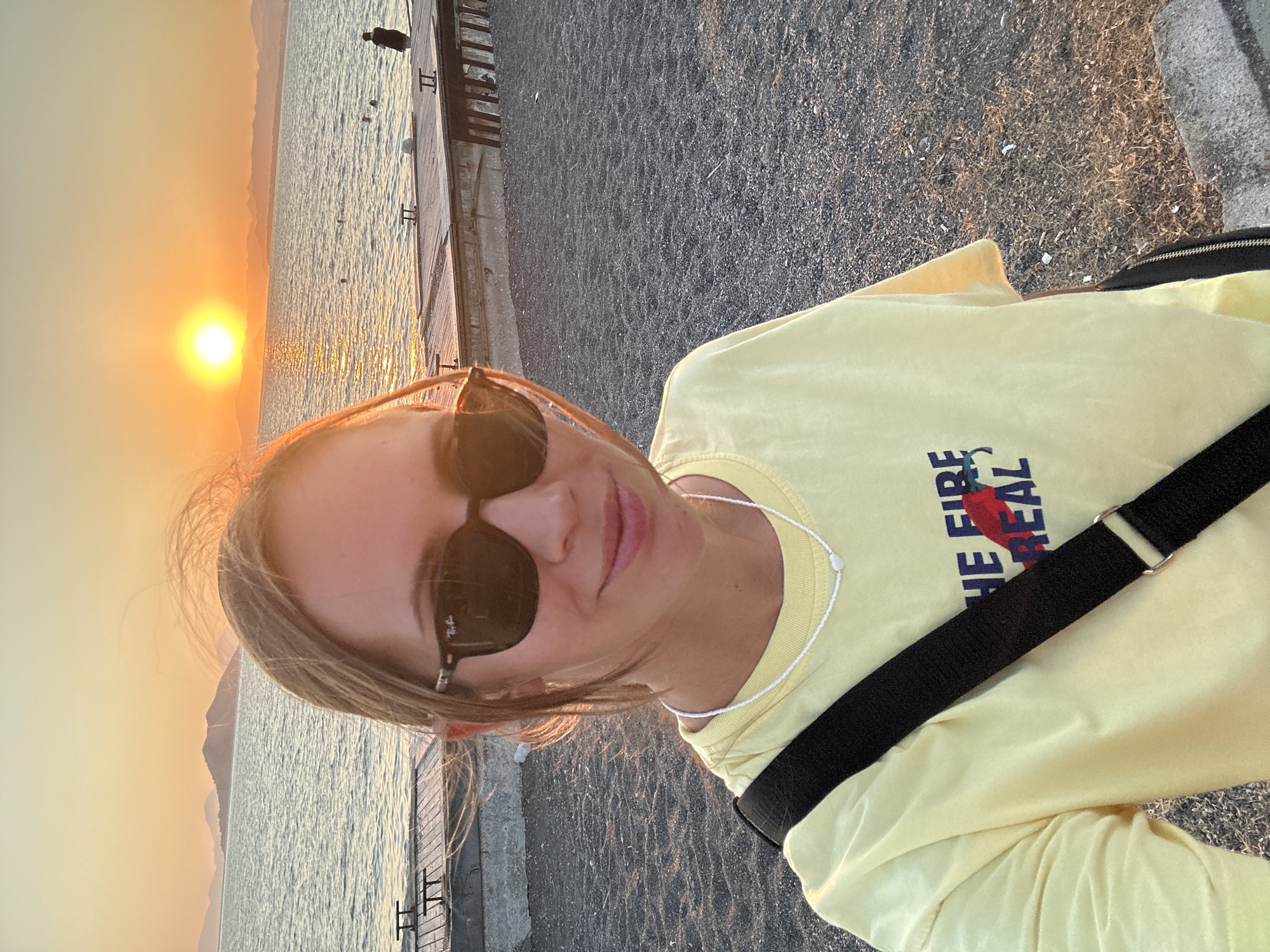 Golden hour on a busy Fethiye pebble beach