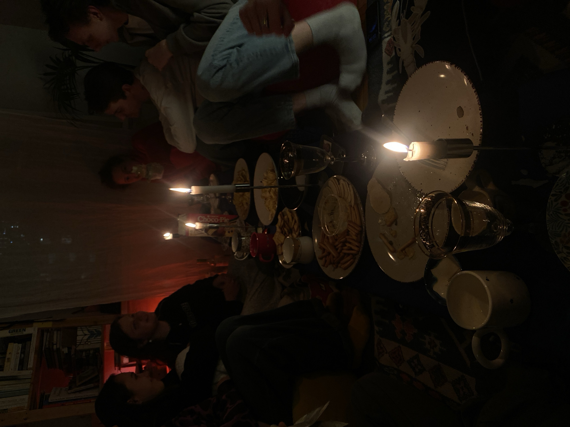 Young adults gather for candlelit dinner in Moscow