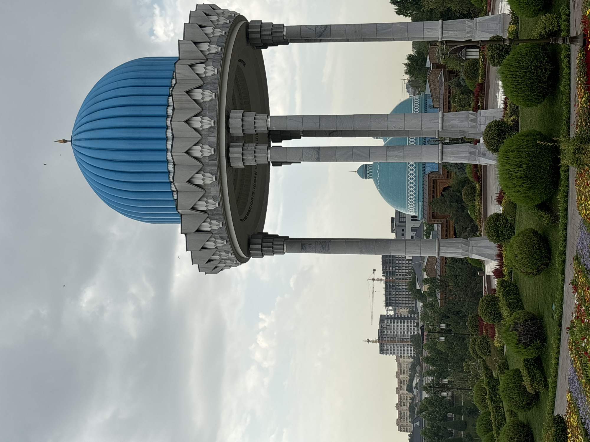 Tashkent's monuments, parks, and street-level details on a cloudy morning