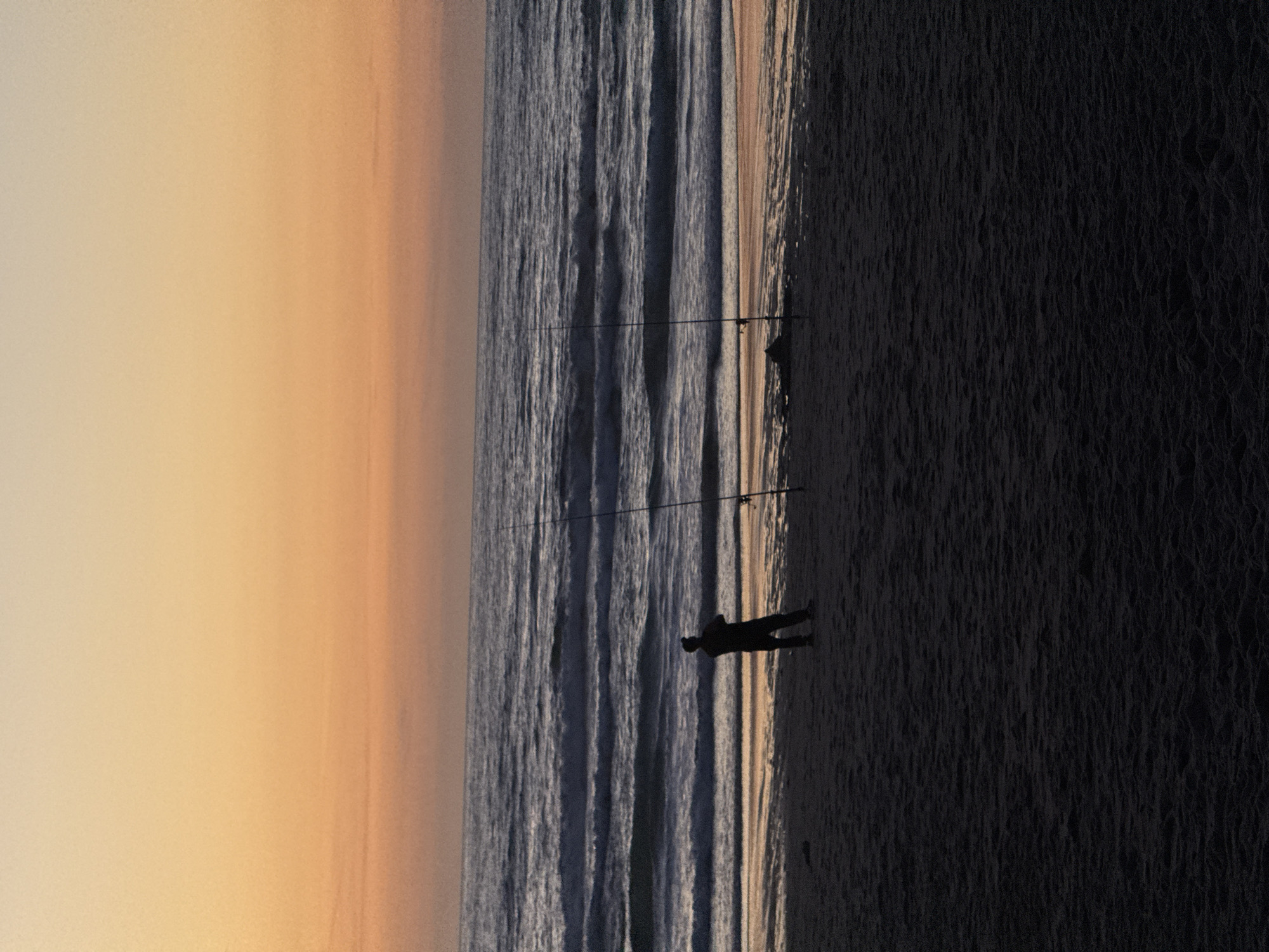 Sunset fishing scene captured on Bidart beach, France