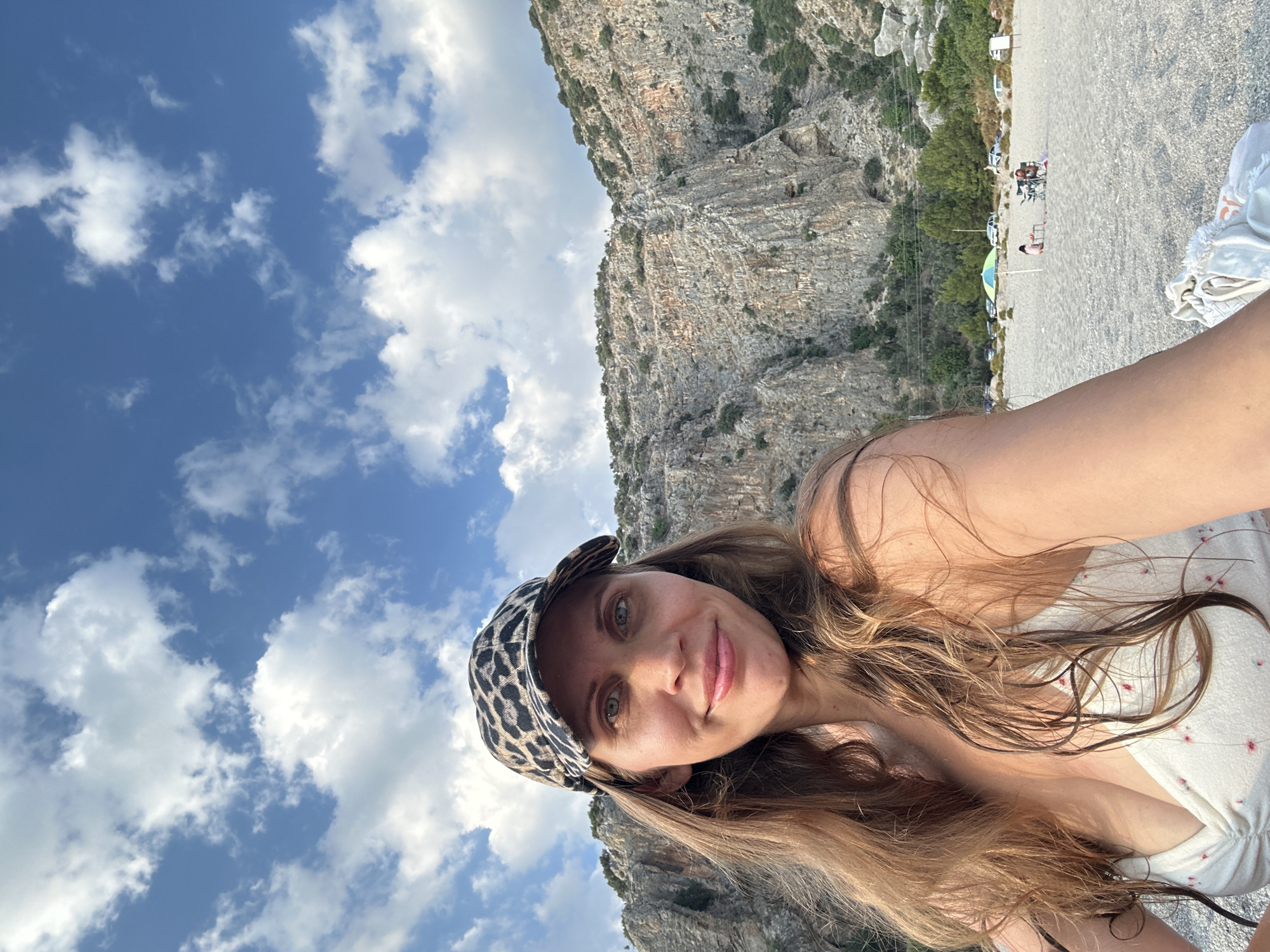 Golden hour on a Fethiye pebble beach, paddleboards and all