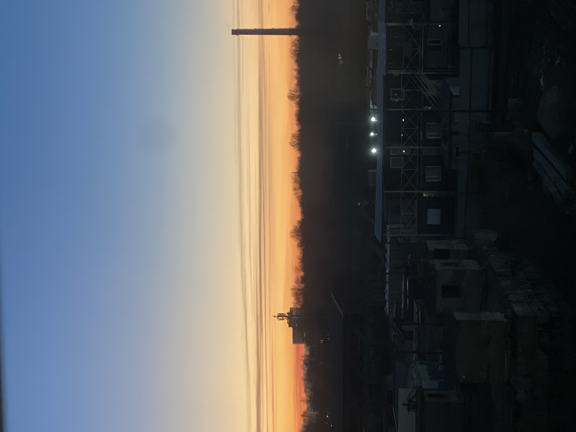 Industrial sunset captured over Saint Petersburg skyline