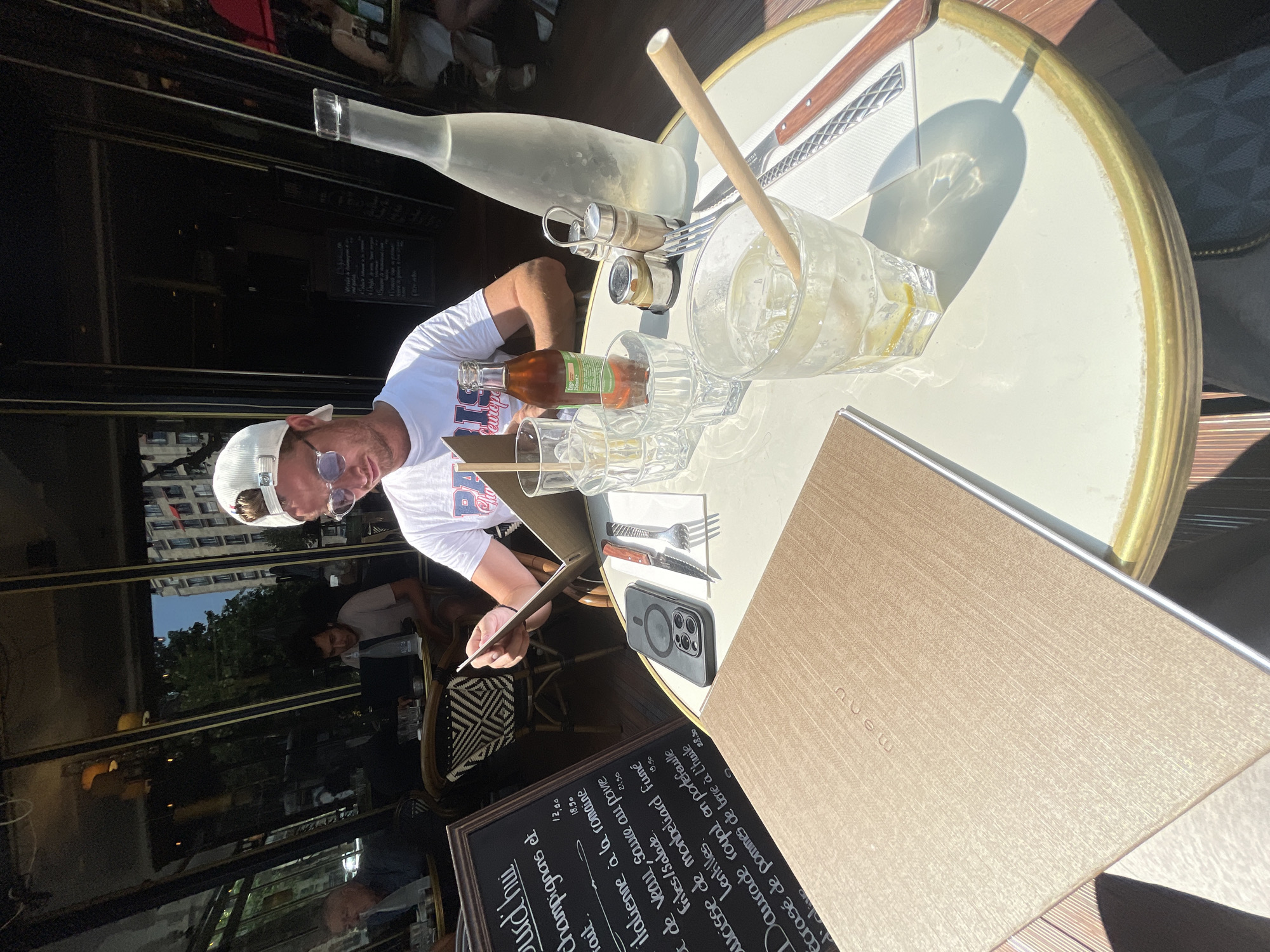 Lunch at a sunny Paris café, menu to meal.