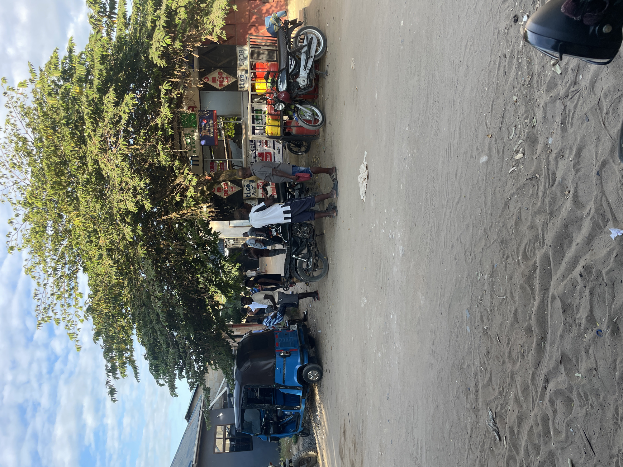 Street life and movement in Dar es Salaam on a sunny afternoon