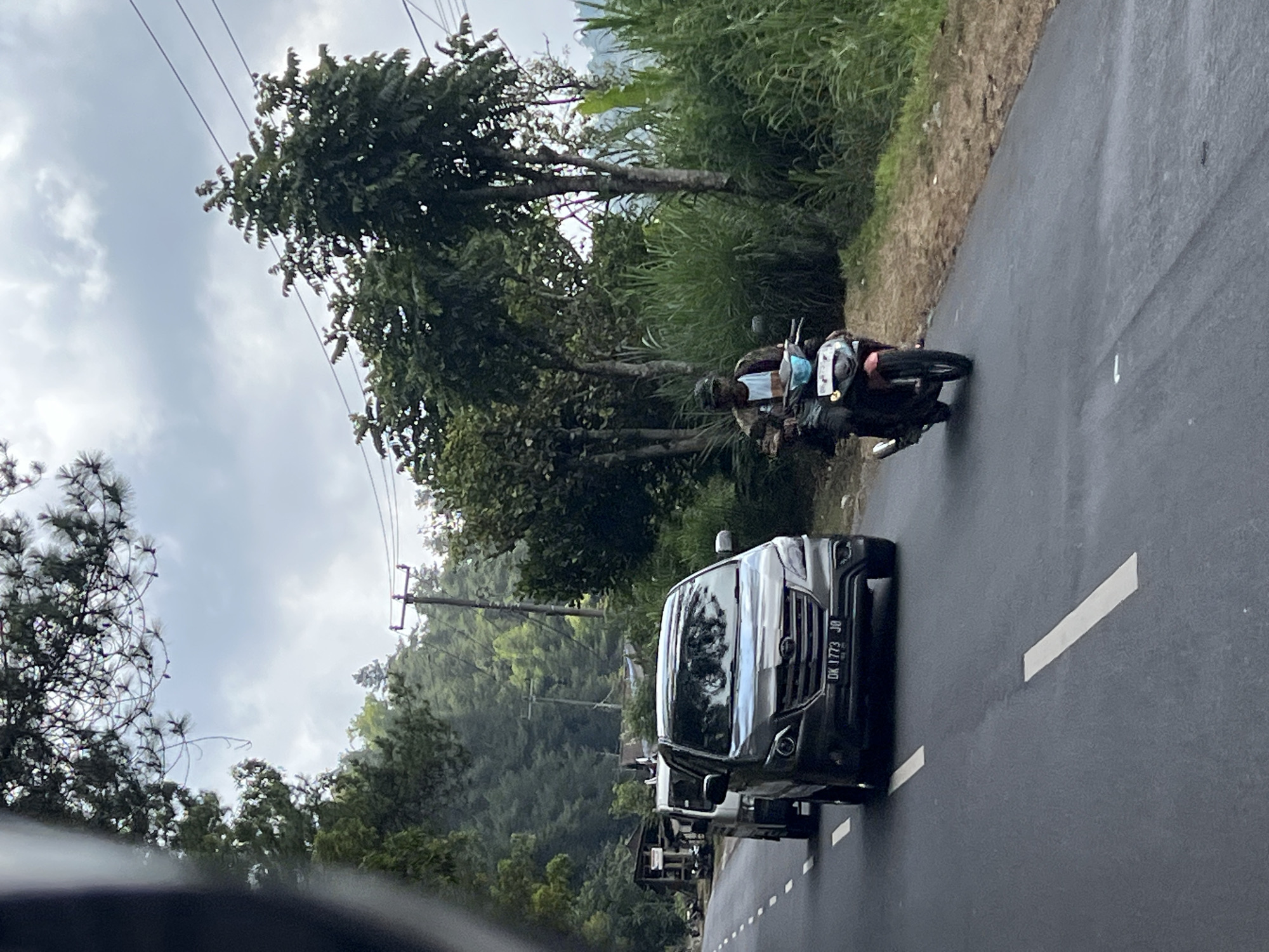 Traffic moving through Kintamani's winding mountain roads