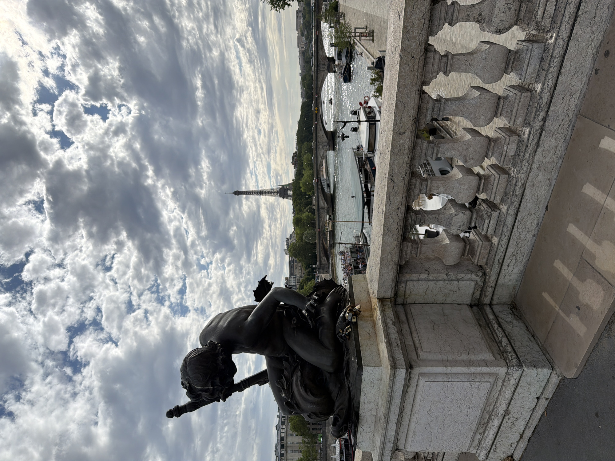 Bronze merman sculpture on Pont des Arts, Paris
