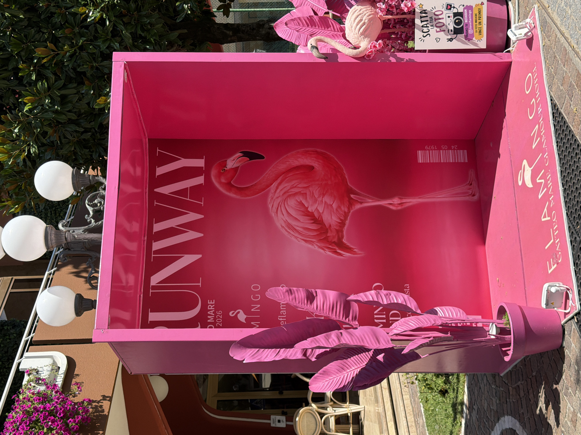 Flamingo-themed street display takes over a Gatteo walkway
