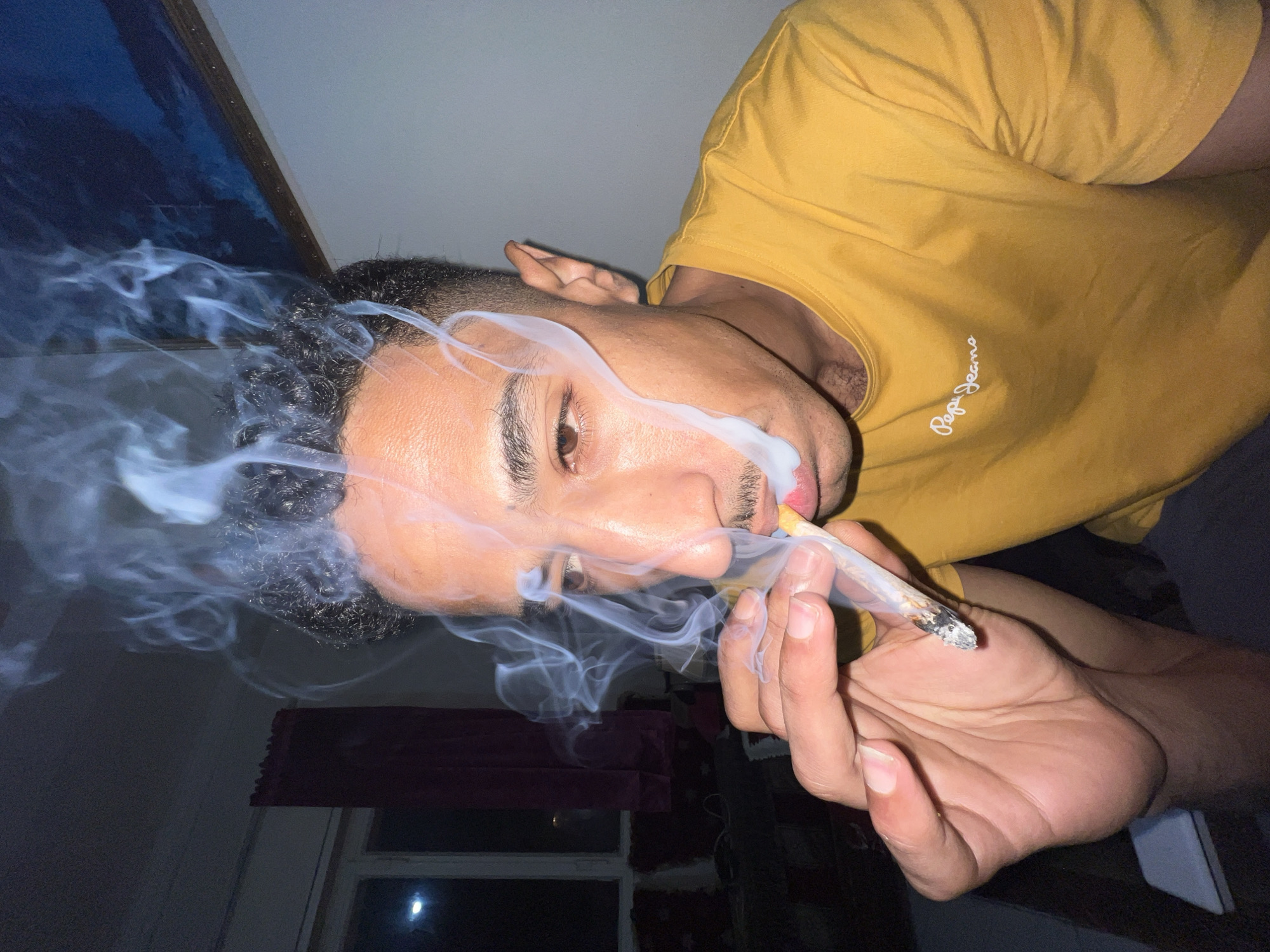 Person smoking joint in Tangier early morning hours