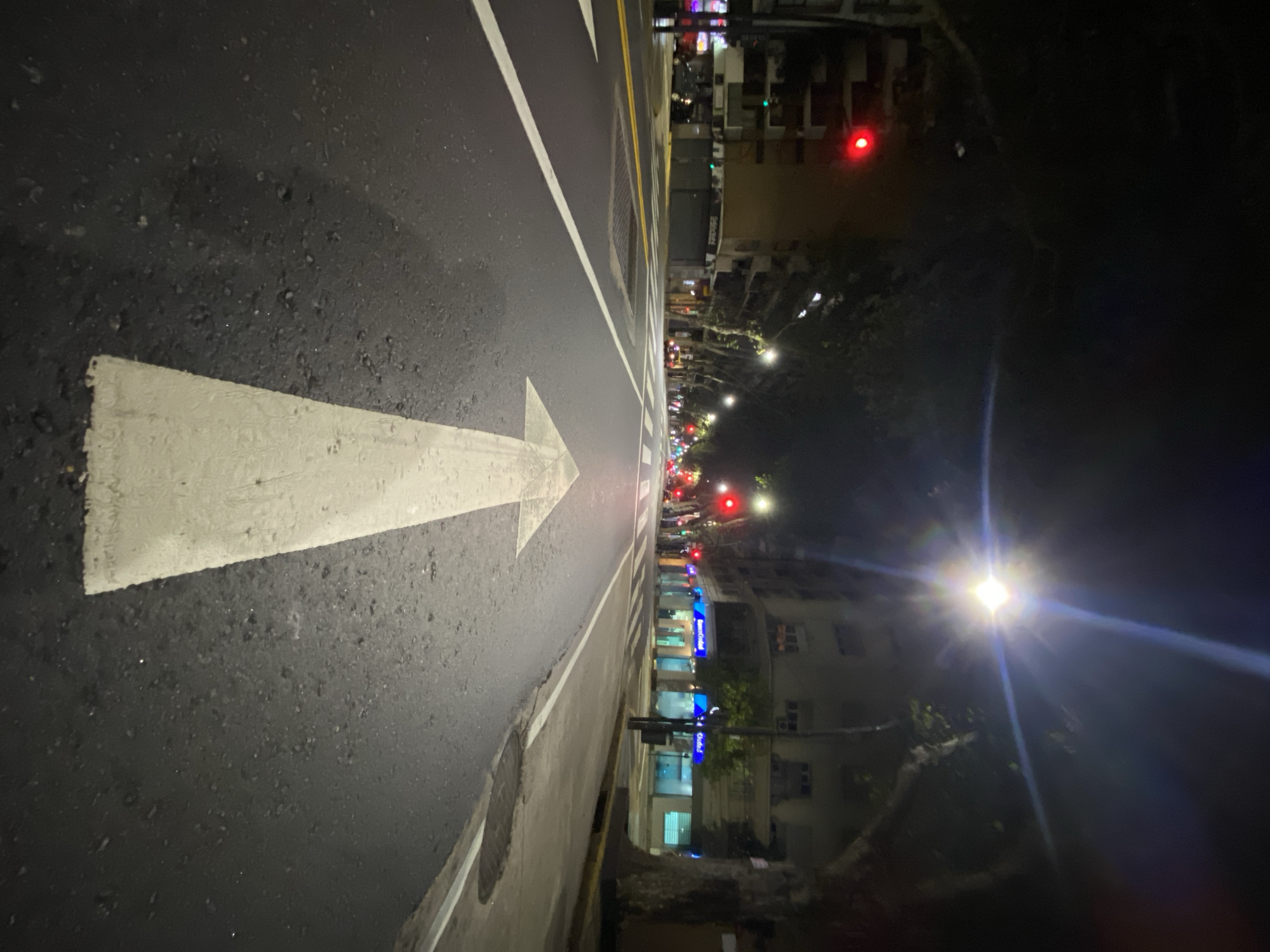 Man stands on Buenos Aires crosswalk during nighttime