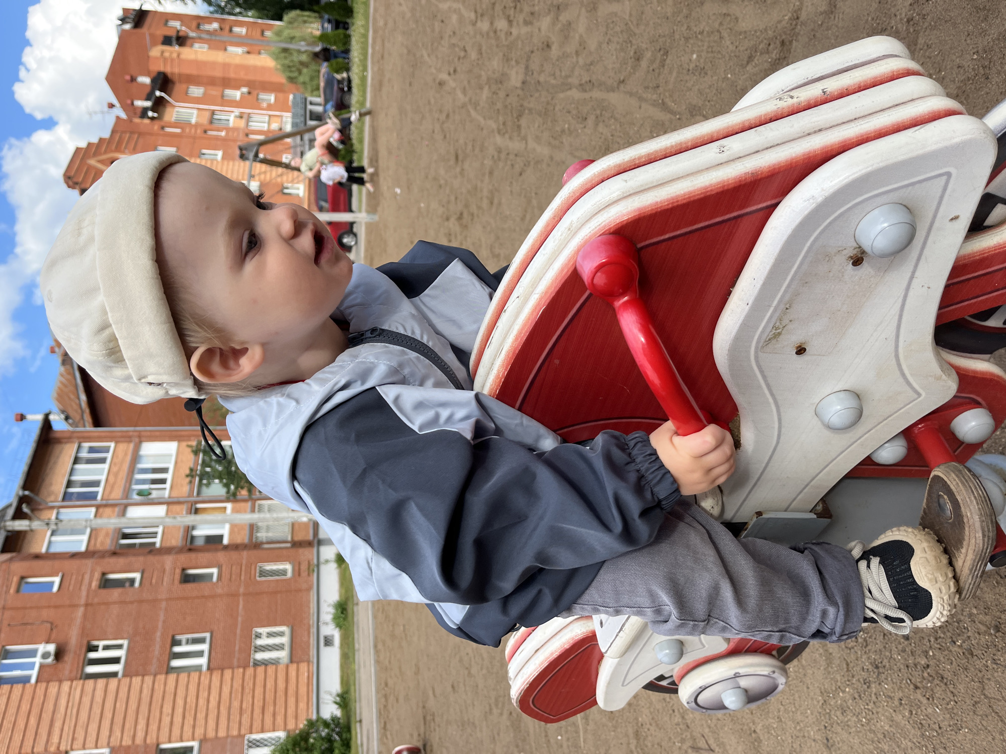 Families enjoy sunny afternoon outdoors in Chaikovsky, Russia