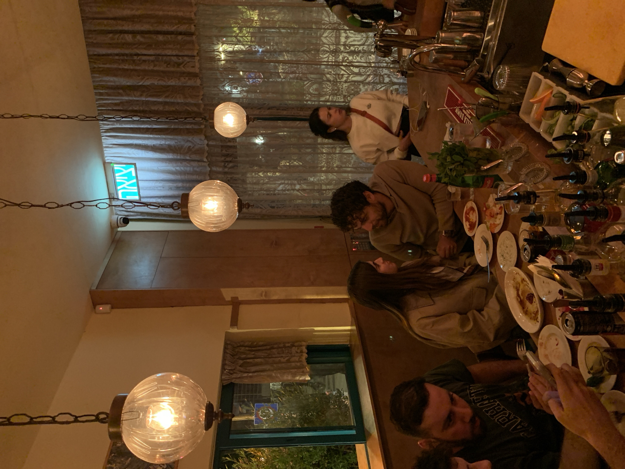 Tel-Aviv scenes: restaurant dining and street art captured