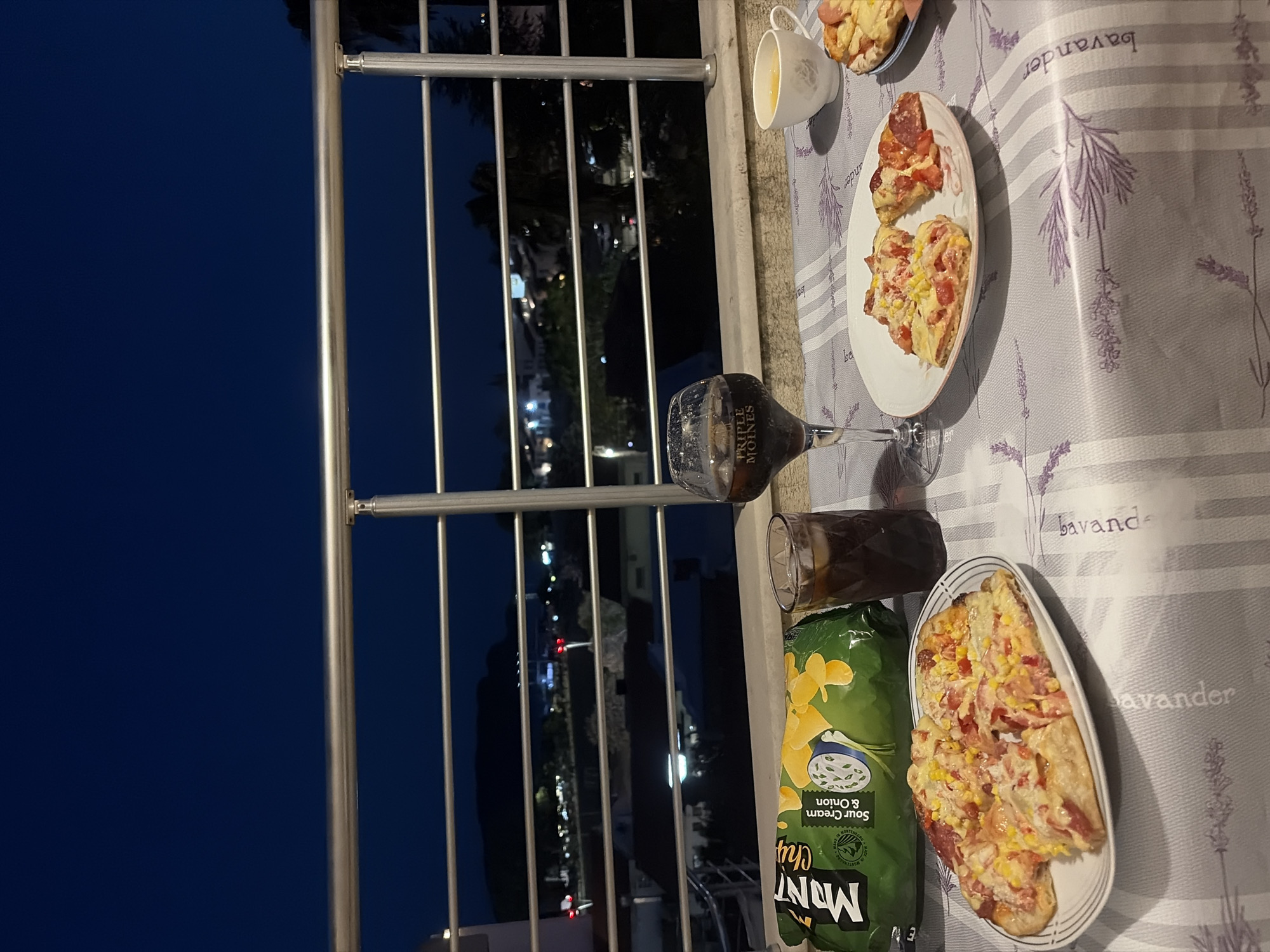Balcony evening in Budva: pizza, kids, and coastal views