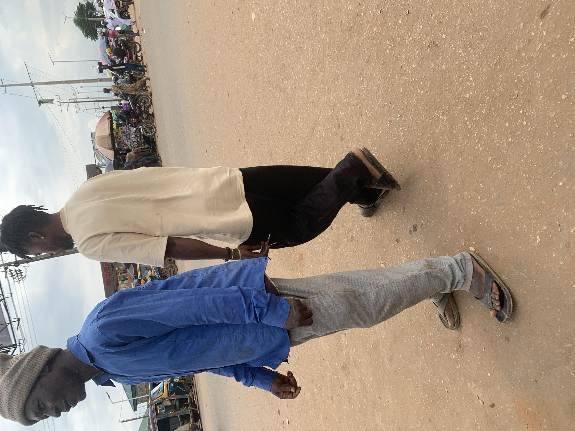 Foot traffic and street commerce on a Shagamu afternoon