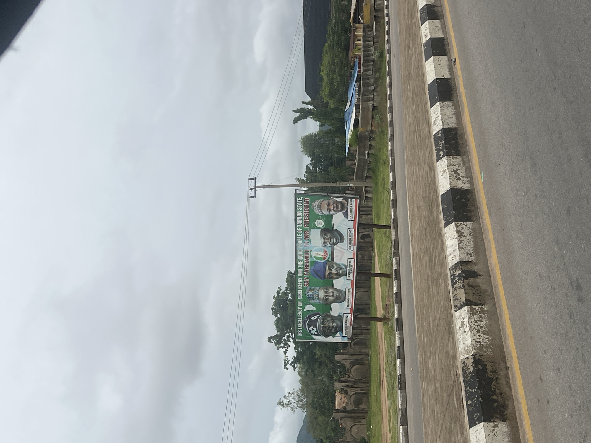 Street life documented in Jalingo, Nigeria during midday hour