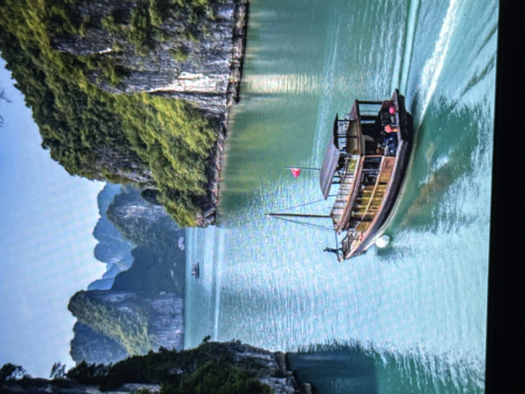 Southeast Asian landscapes, temples, and beaches with scattered cartoon imagery