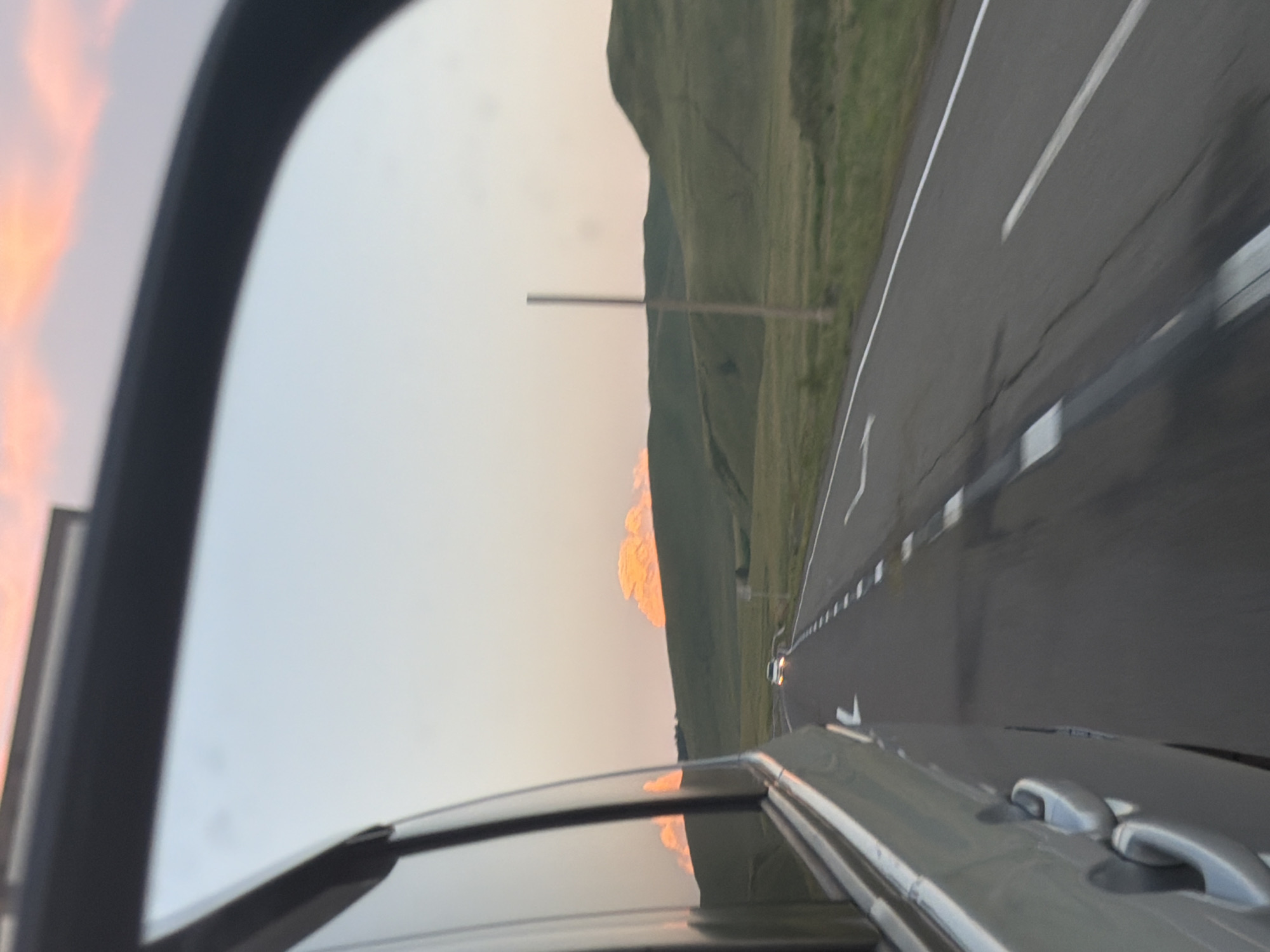 Driving through Siberian steppe at twilight near Сарагаш