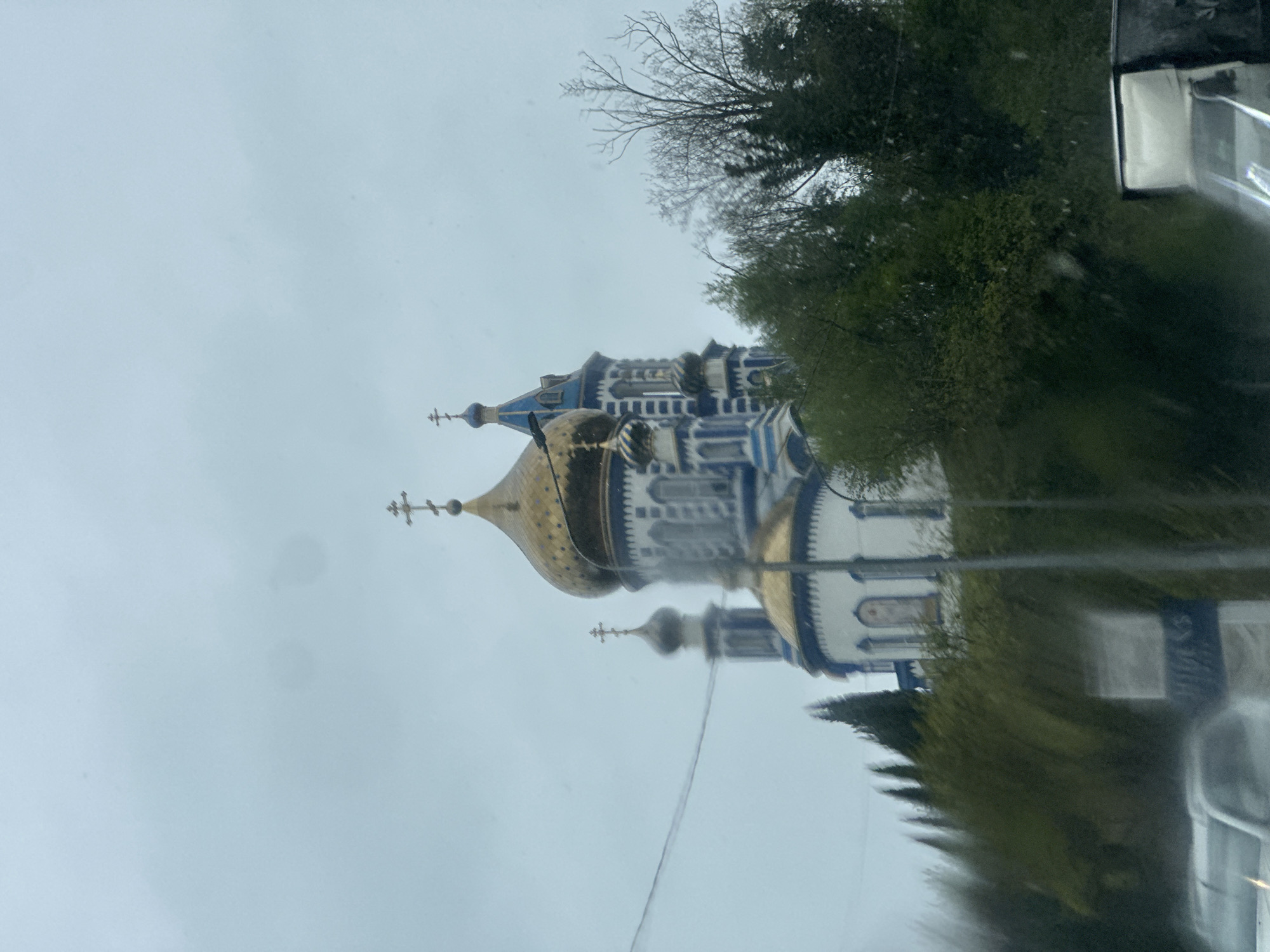 Morning scenes captured in Nebug: church photography and rainy road travel
