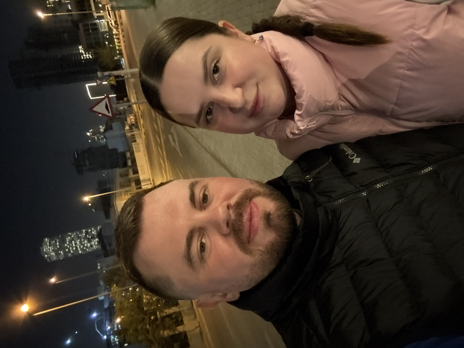 Couple documents evening outing in Dubai with selfies, cat