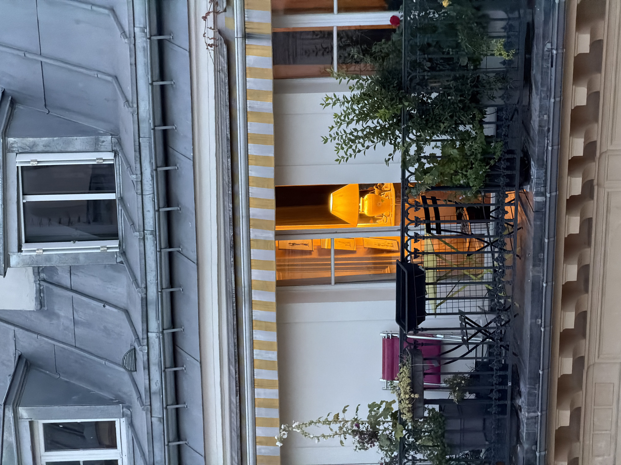 Balcony life and Haussmann-era facades in Paris
