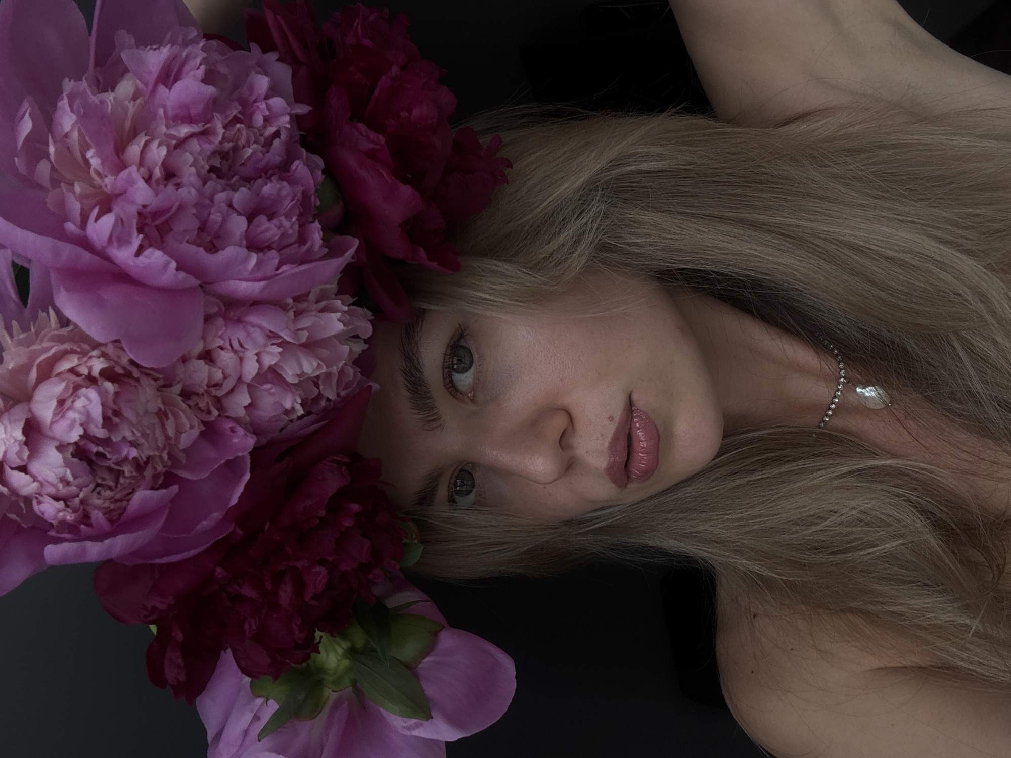 Artistic peony portrait session captured by independent witness