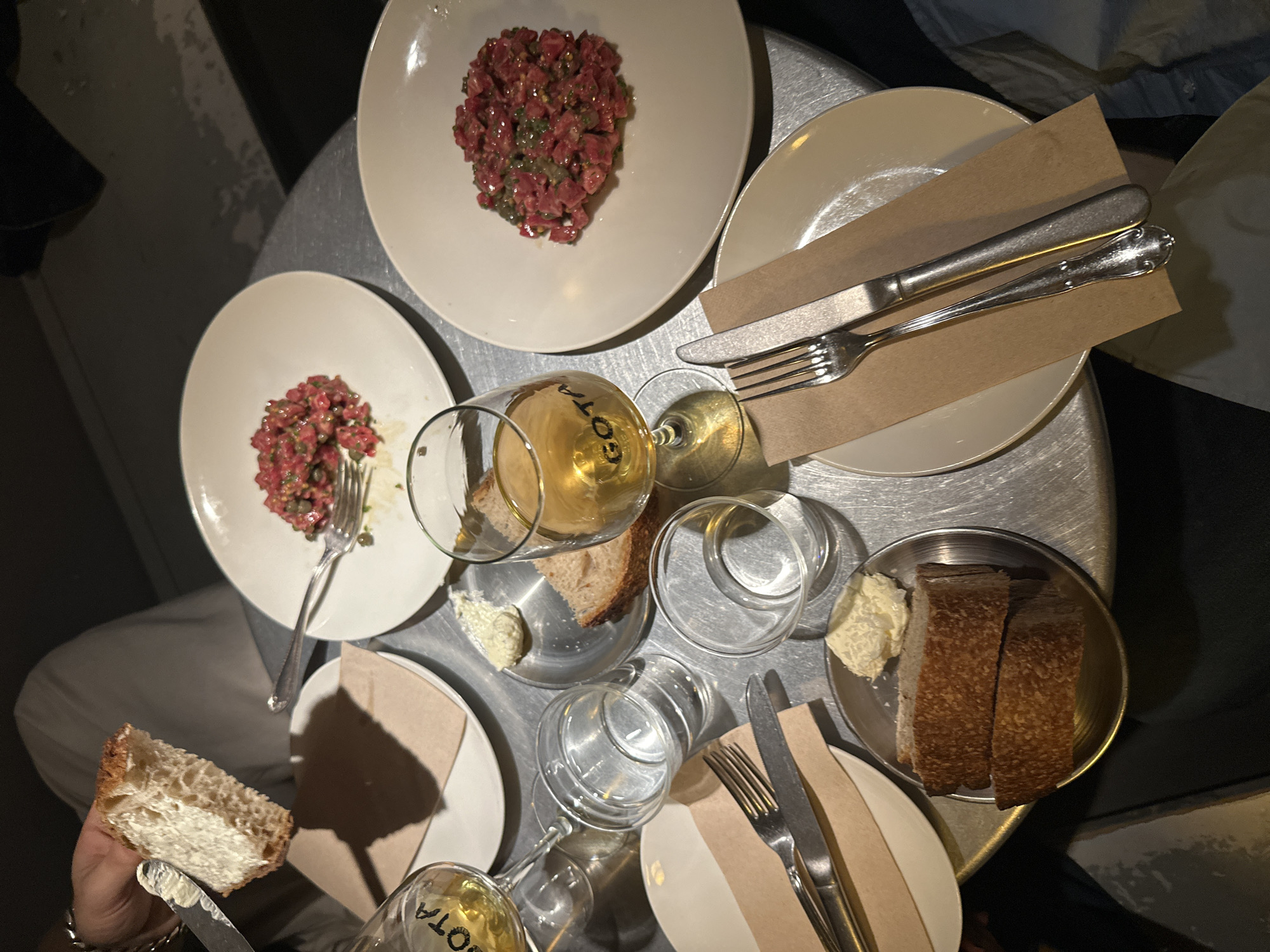 Dinner documented at Madrid restaurant through evening meal progression