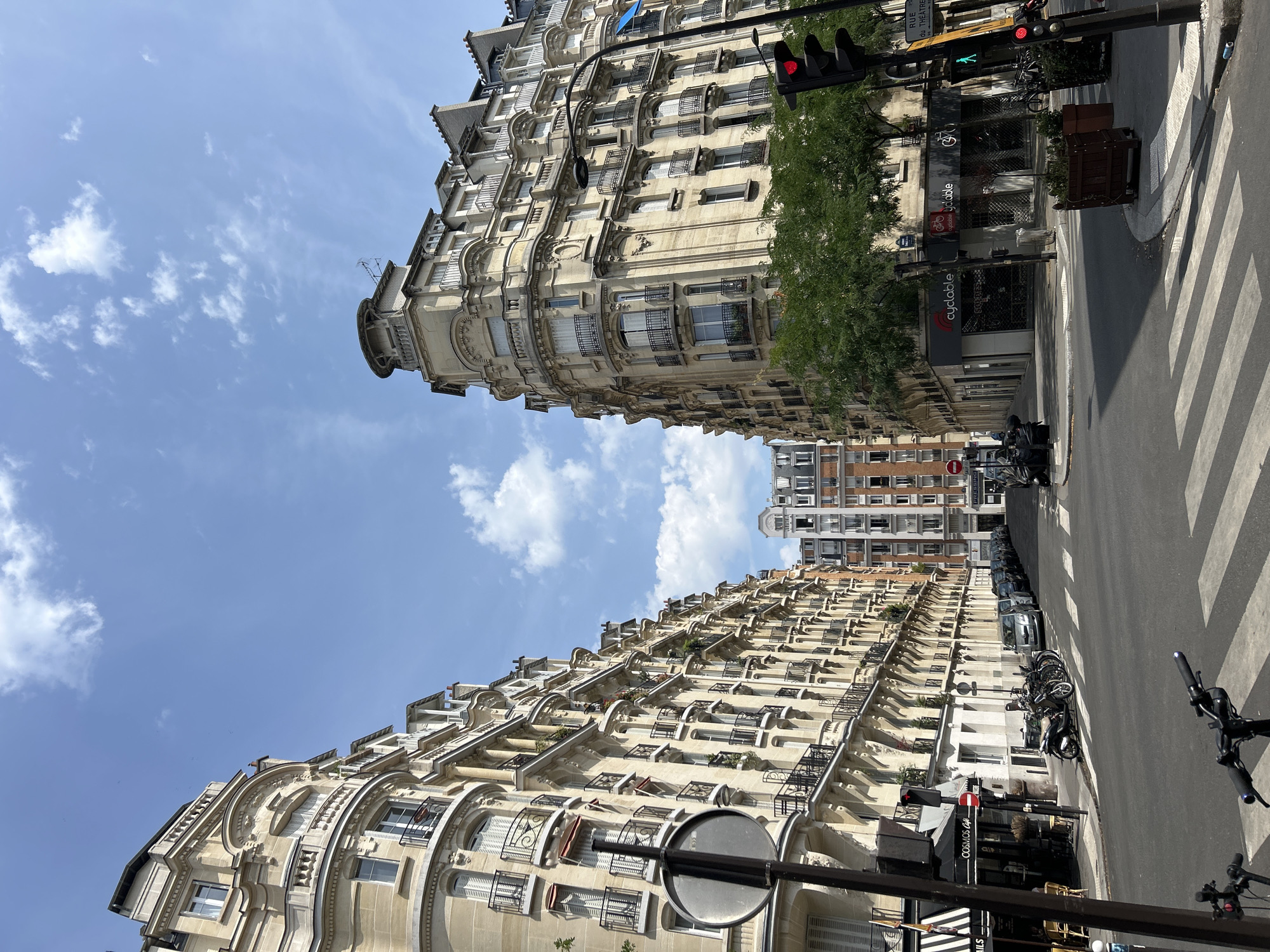 Haussmannian streetscape on a sunny Bastille Day in Paris