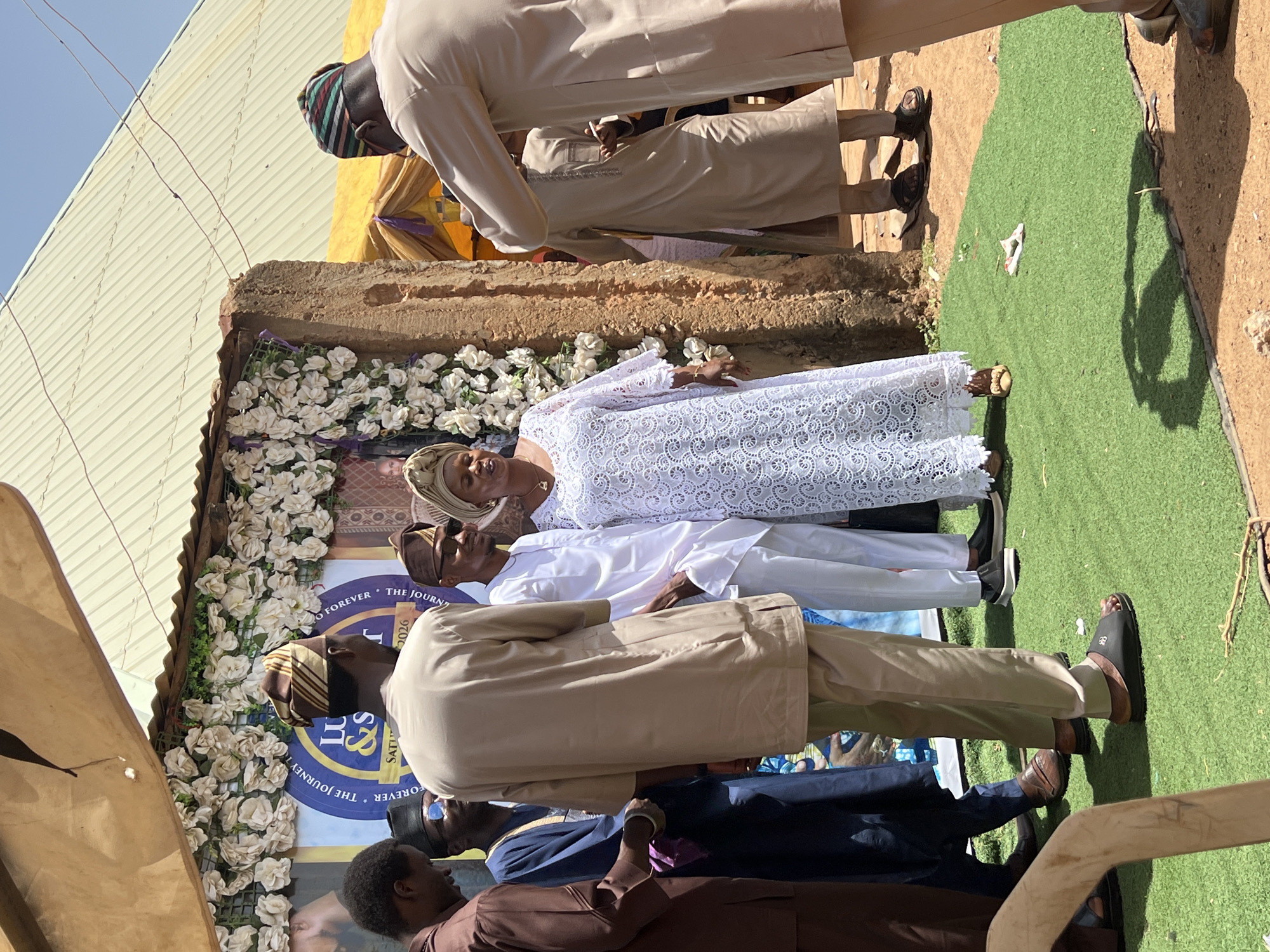 Community celebration with formal gathering in Rigasa, Nigeria