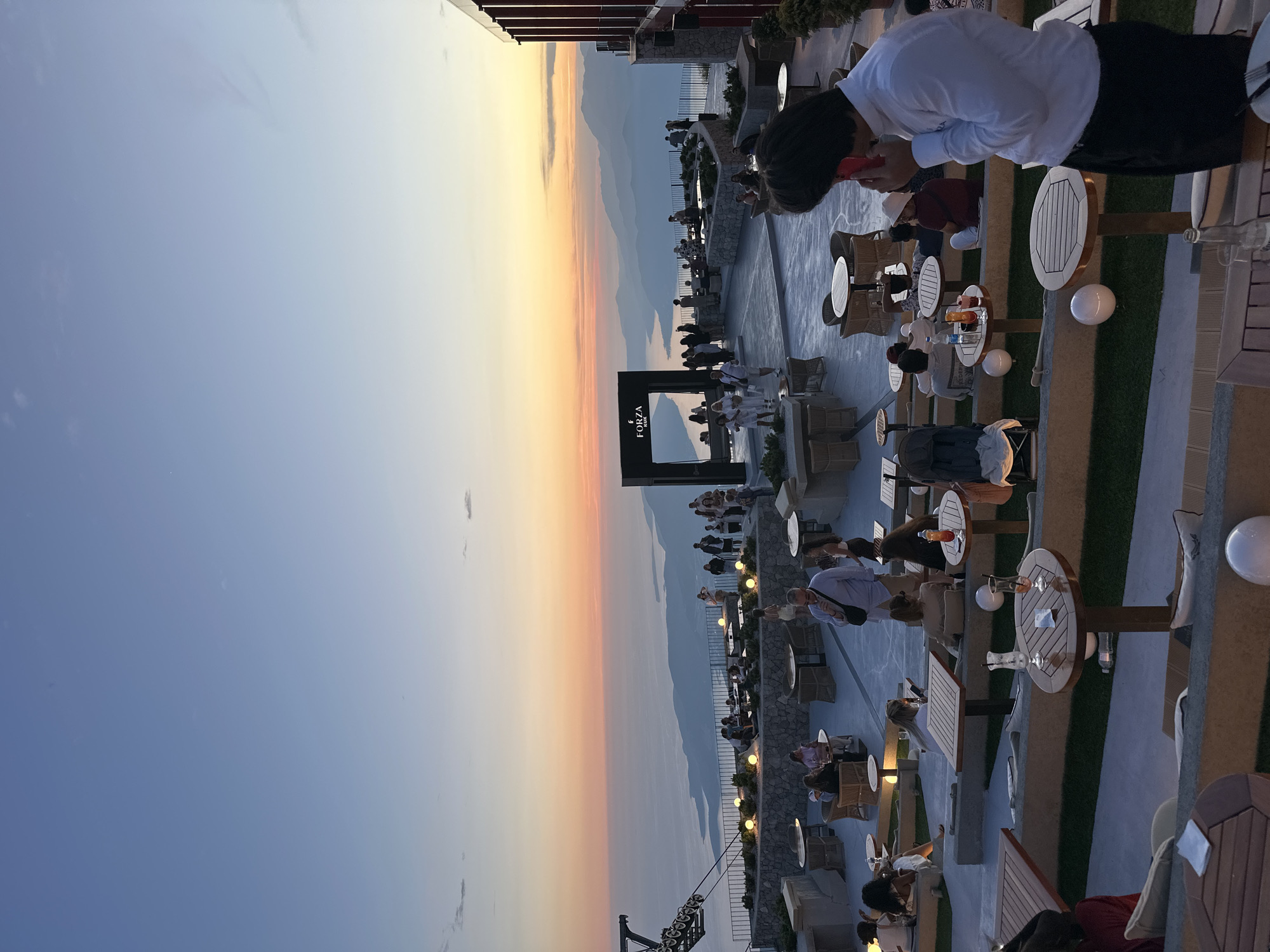 Tourists enjoy sunset dining and sightseeing around Kuk, Montenegro