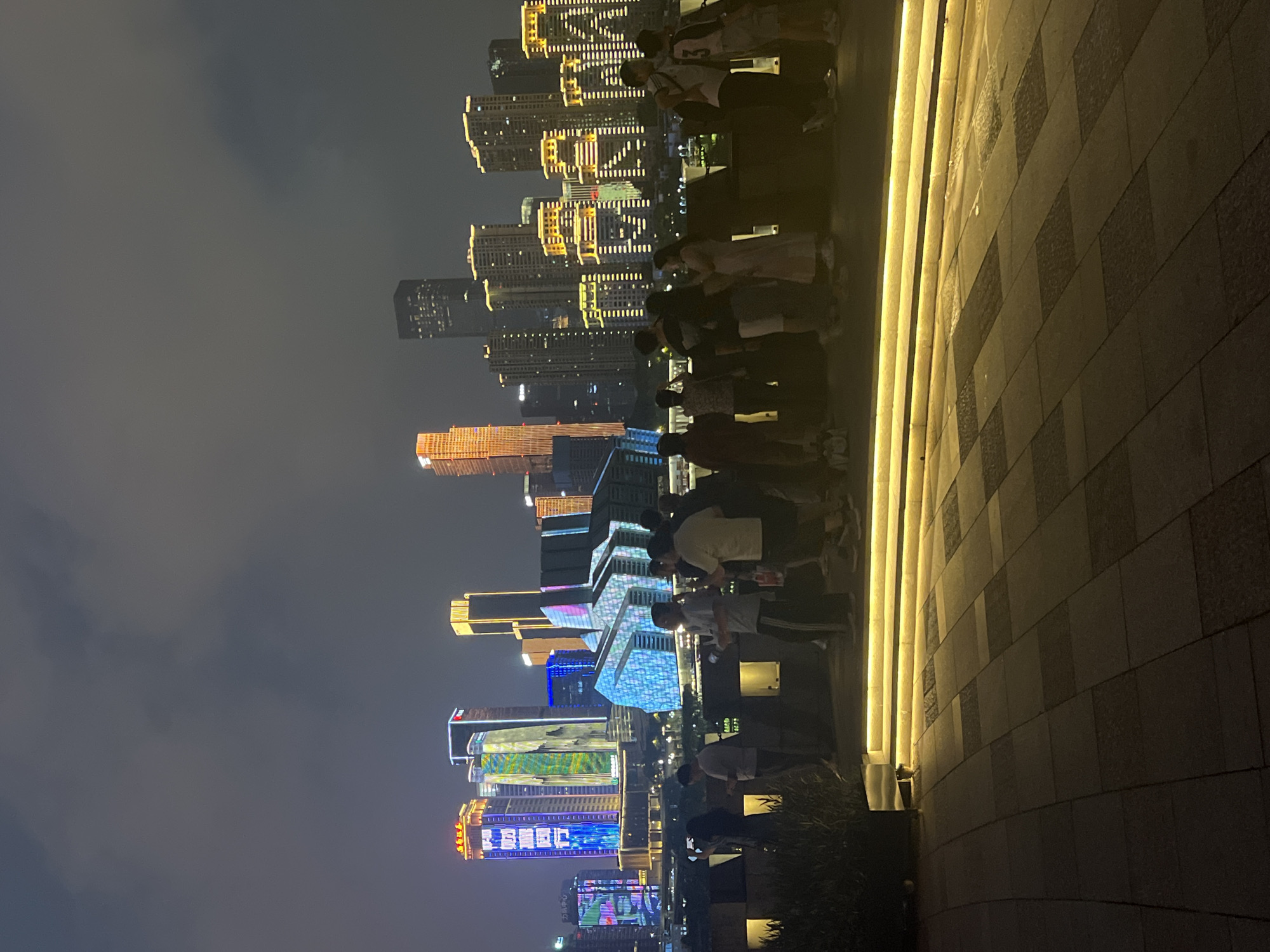 Chongqing's Yuzhong District skyline and waterfront lit up at night
