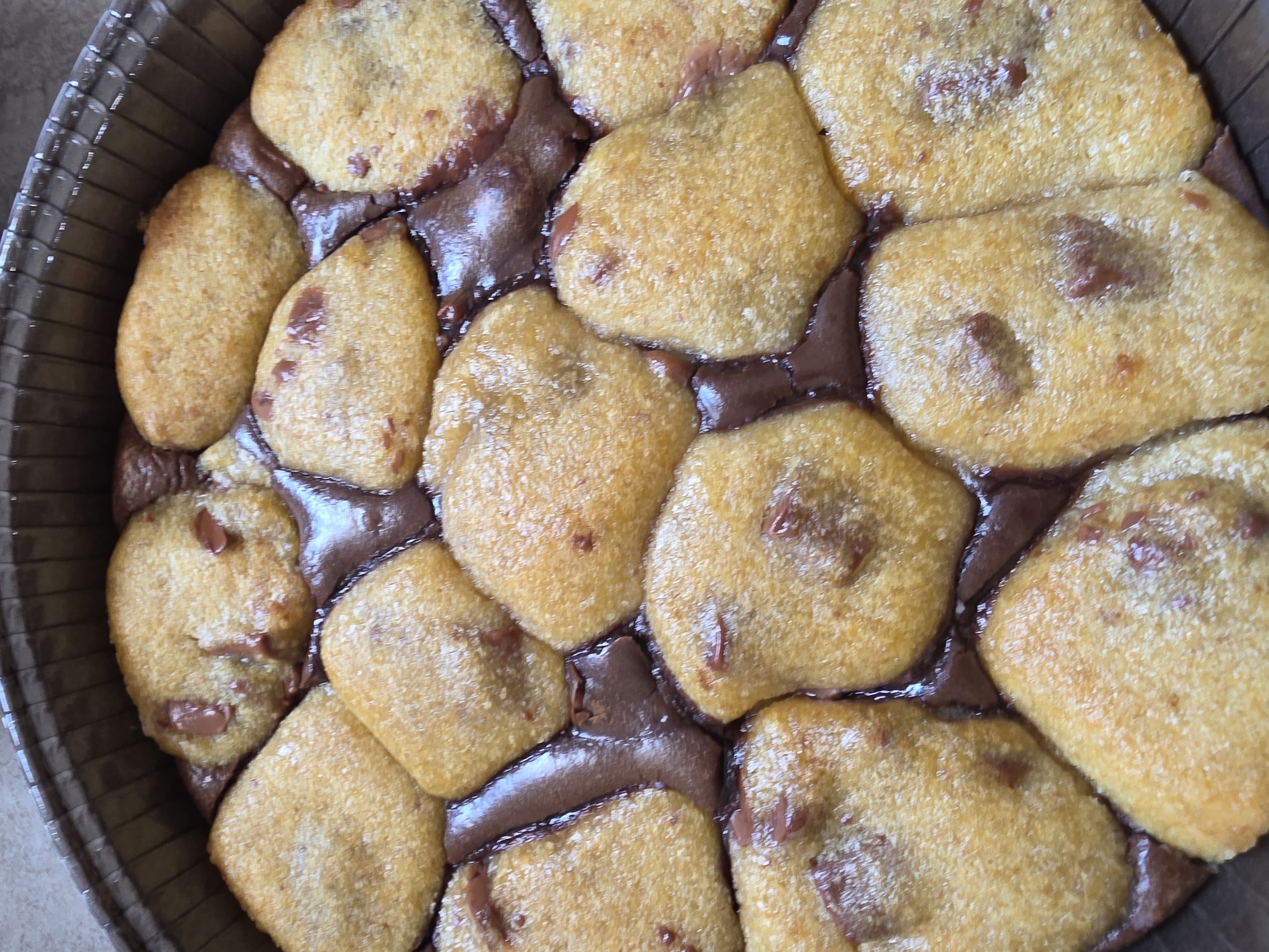 Hybrid brownie-cookie dessert photographed in round baking pan