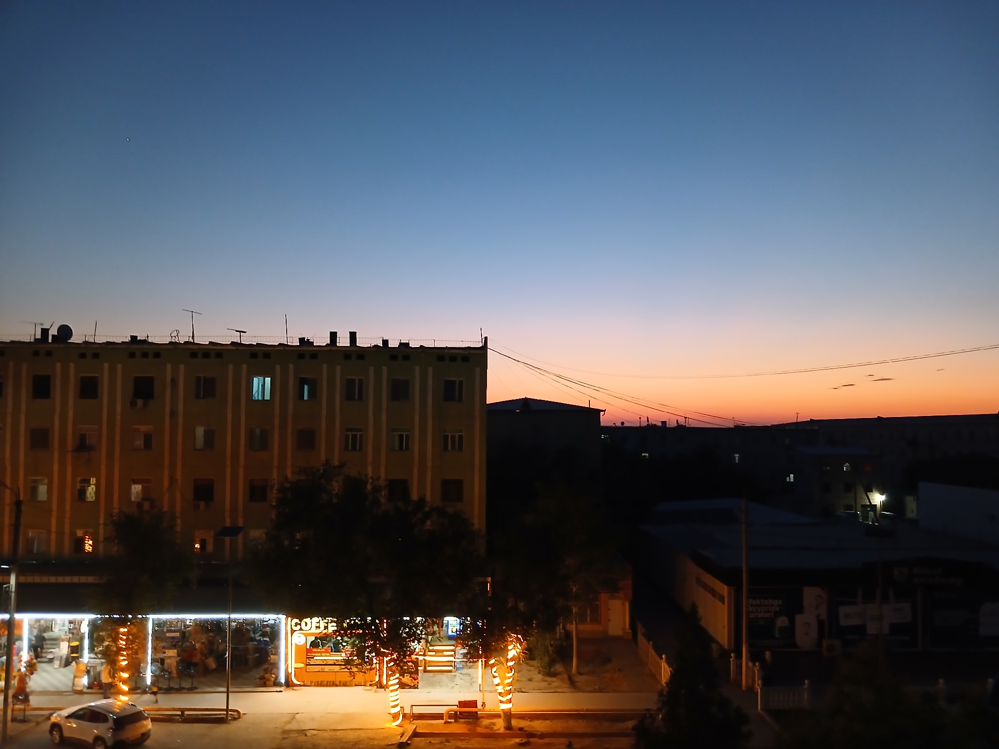 Dusk falls over a residential block in Qorowul, Uzbekistan