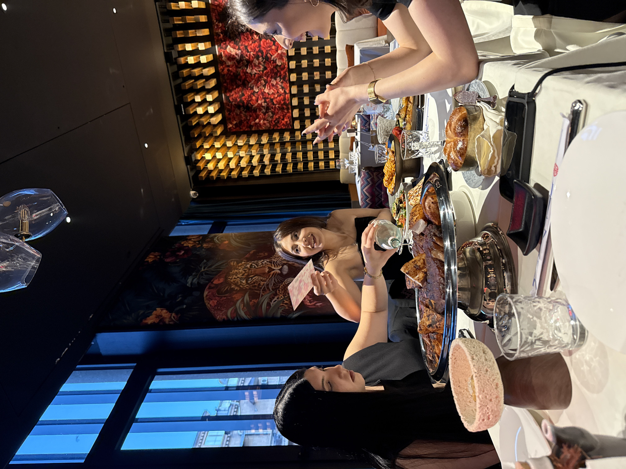Women dine at restaurant table in Yerevan, Armenia