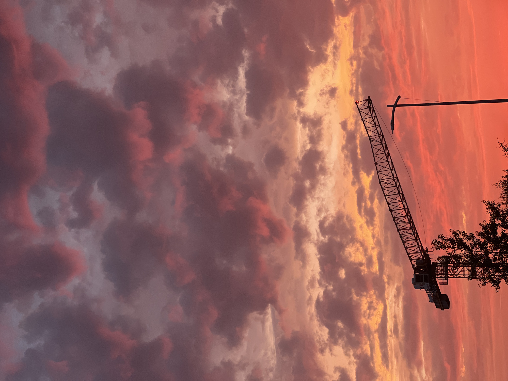 Dramatic midsummer sunset sky over Rotmanka, Poland