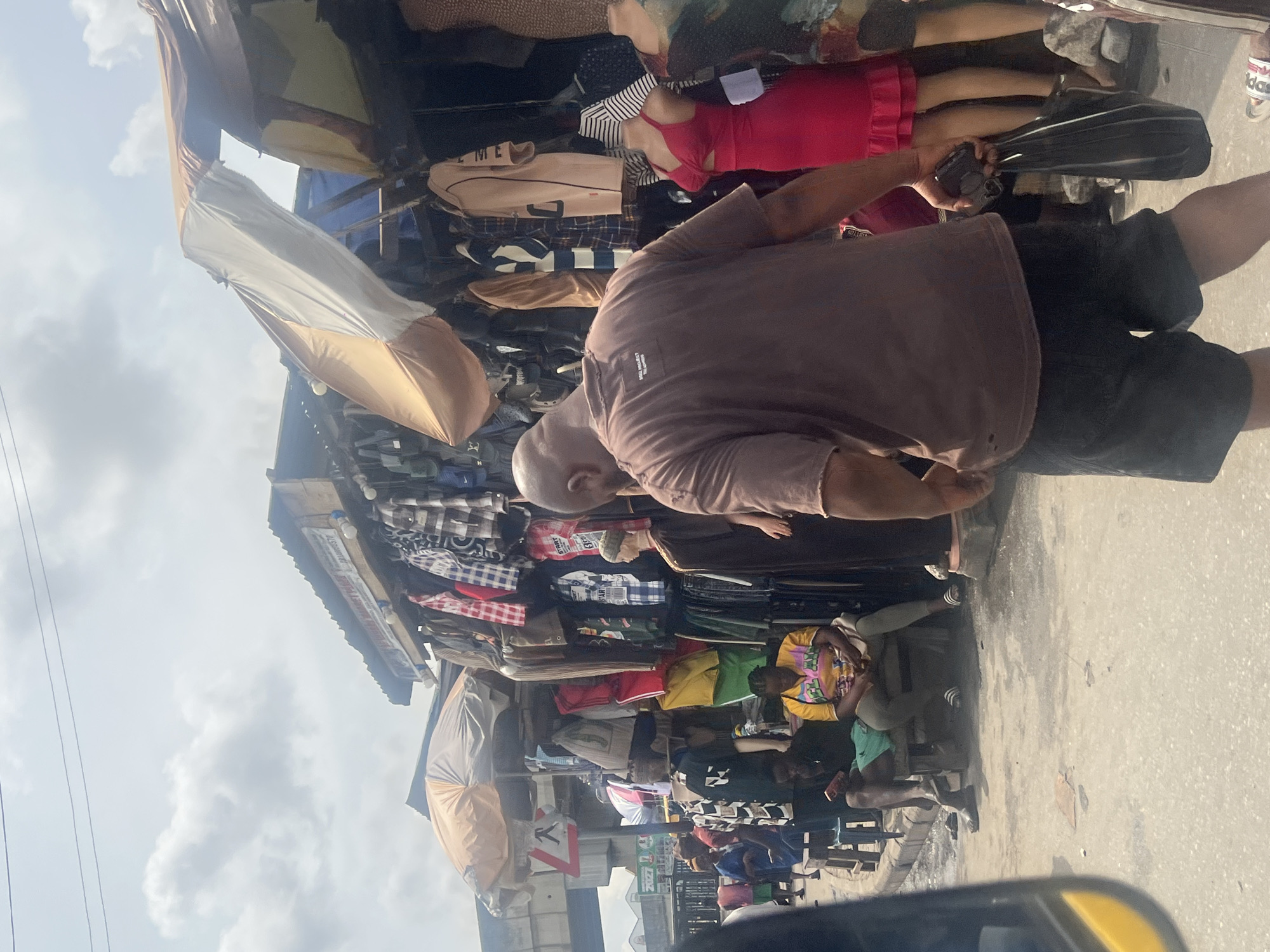 Market shopping and motorcycle traffic captured in Nigerian towns