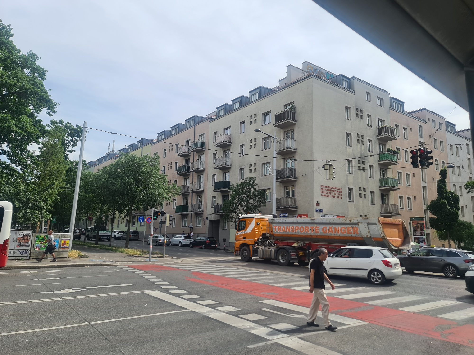 Vienna streets, tram stops, and residential architecture on a June afternoon