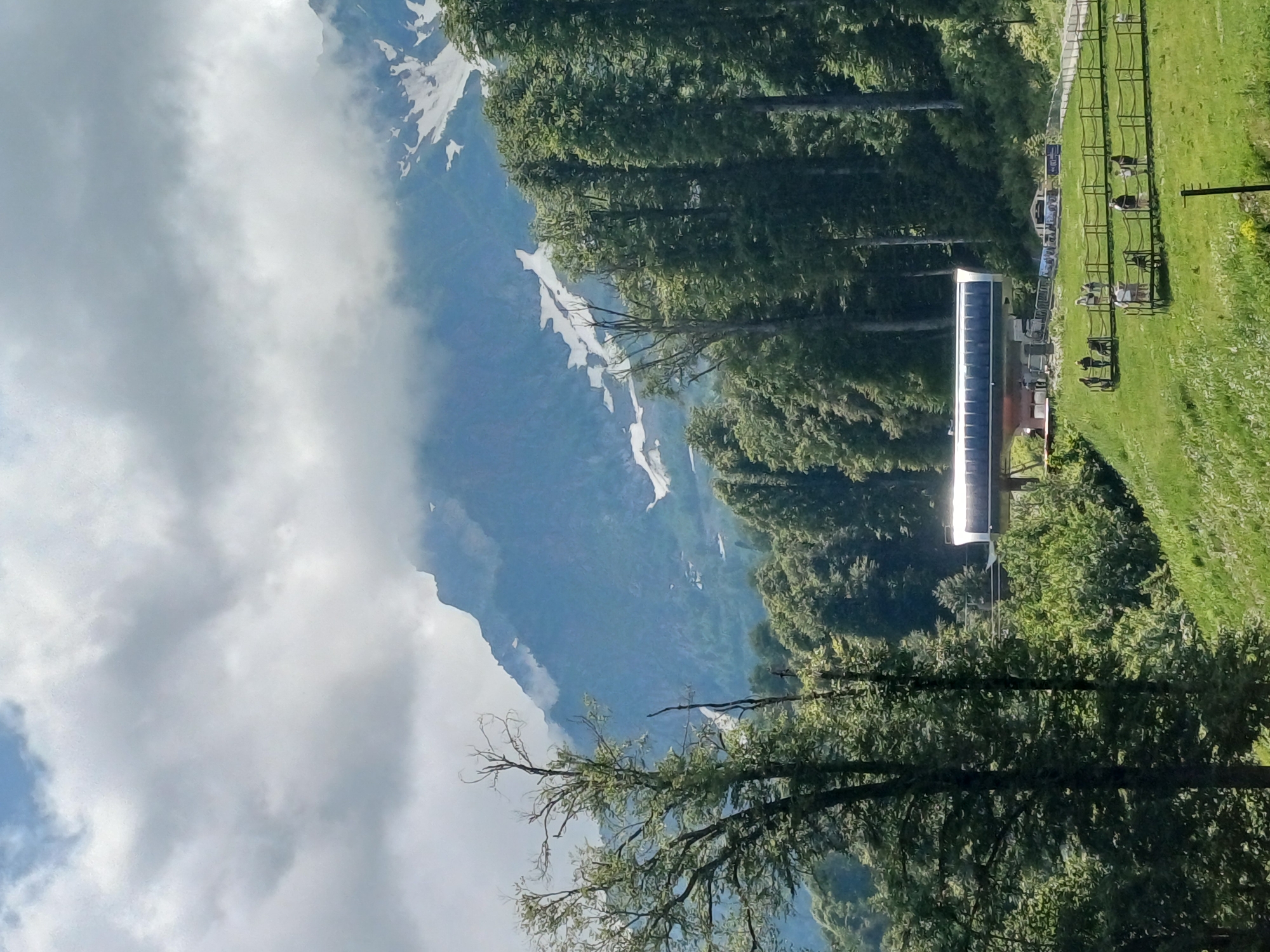 Summer day at Estosadok's ski lifts, Caucasus mountains in view