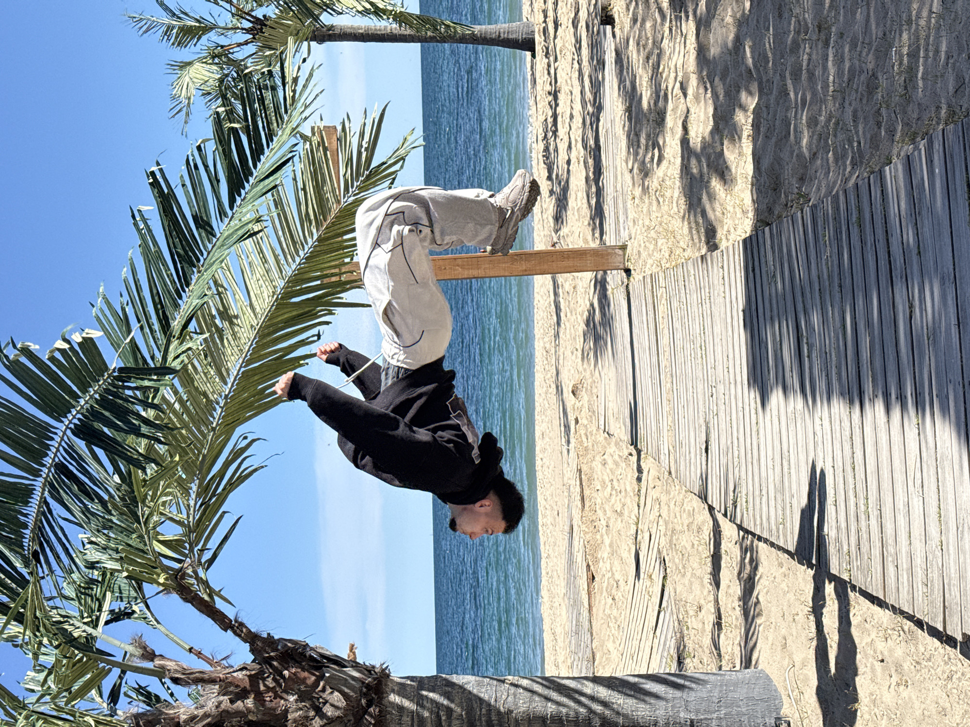 Acrobat performs beach stunts in sunny Varna, Bulgaria