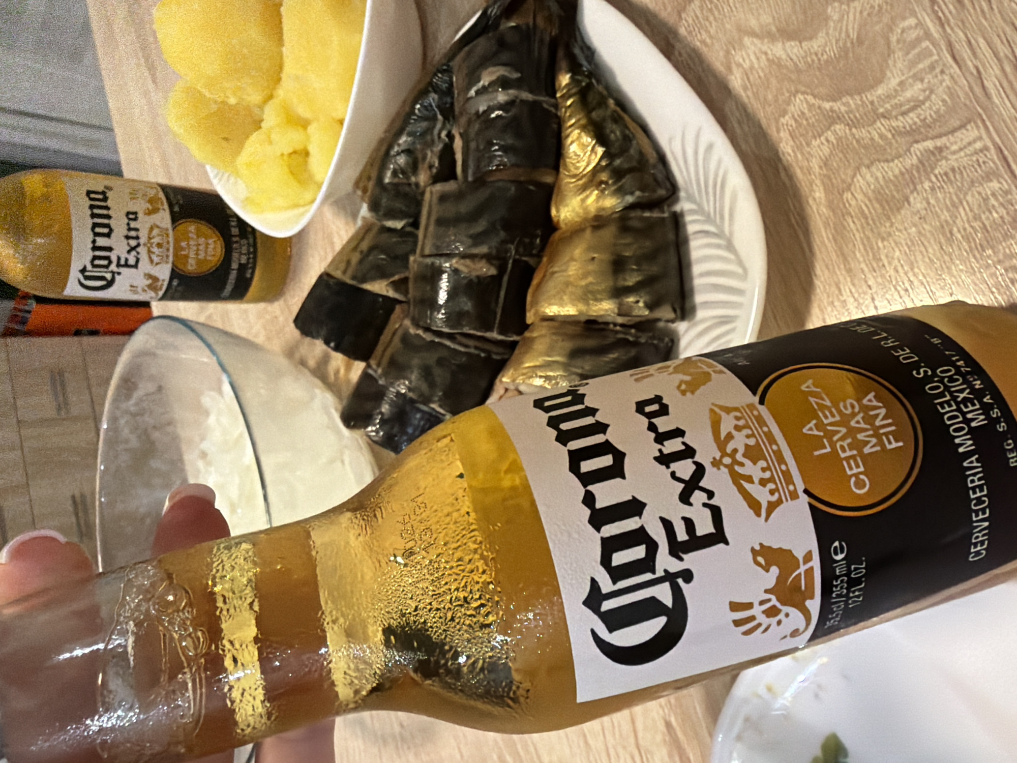 Beer and smoked fish at home, overlooking a Moscow rail yard