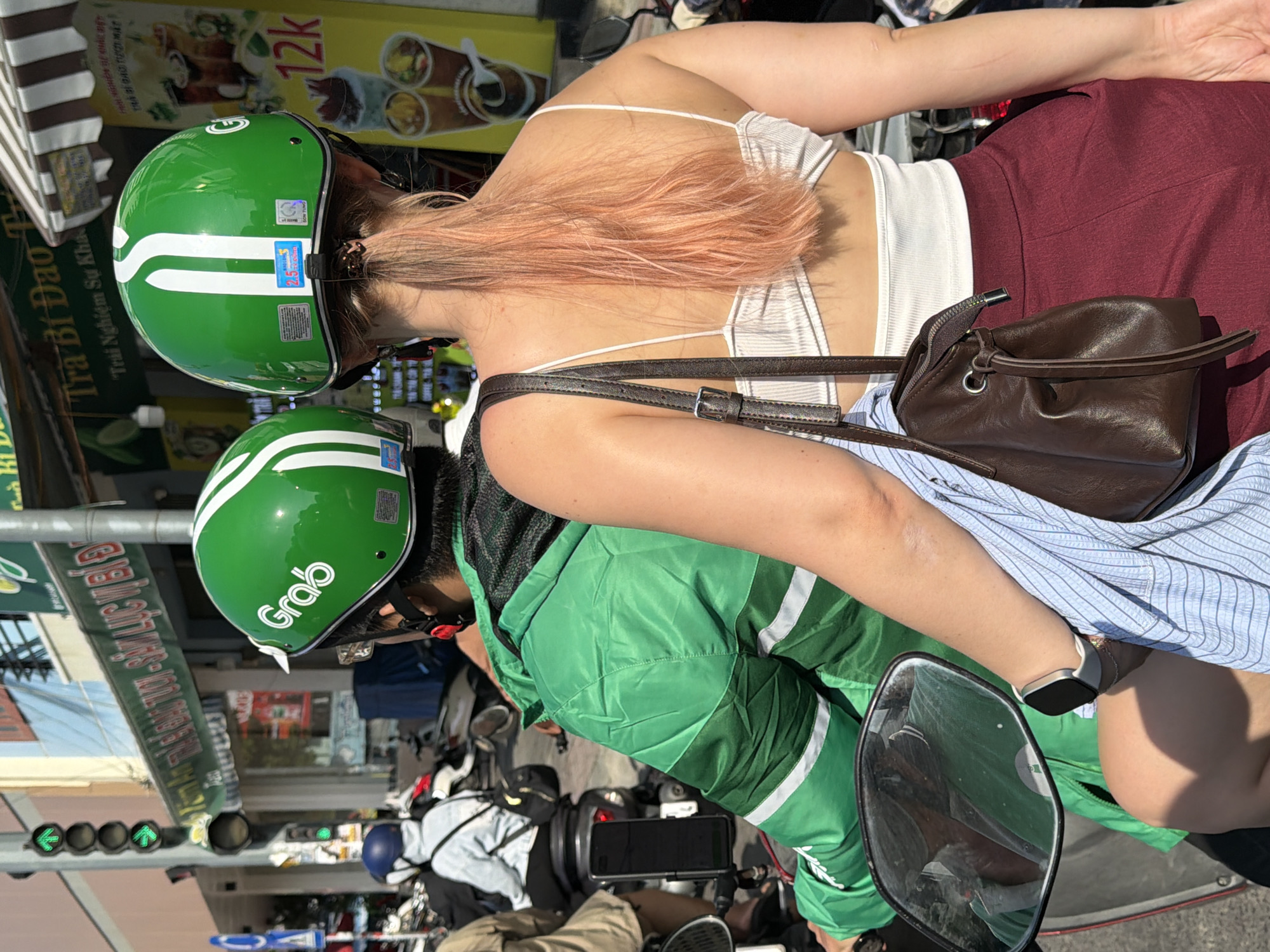 Nha Trang streets buzzing with scooters, cyclists, and everyday commerce